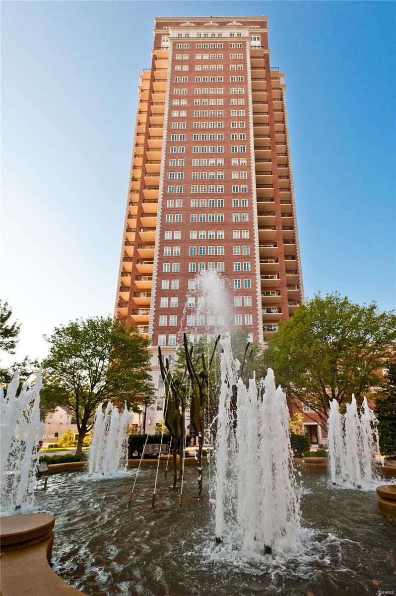 Located on the 22nd floor with northeastern exposures and soaring Arch views, the home has been opened and improved to provide modern living and entertaining. The grand dining and living rooms offer an elegant flow and feature a wet bar with SubZero refrigerators, elaborate moldings, a gas fireplace, and two private terraces. The eat-in kitchen hosts custom cabinetry, commercial appliances, a center island, a breakfast area, and patio access. A dramatic library adjoins the primary en-suite bedroom with Arch views, a custom walk-in closet, and a spa bathroom with stone accents. Additionally, there is a gorgeous powder room, 2 guest bedrooms, a Jack n’ Jill bathroom, a laundry/mud room, a generous storage locker and 2 parking spaces.   The Plaza in Clayton Residences offers world-class services, including valet, concierge, club room, health club, swimming pool, dog run, rooftop park, and electric charging station. Location: Corner Location, Downtown, End Unit, Retail Center, Upper Level