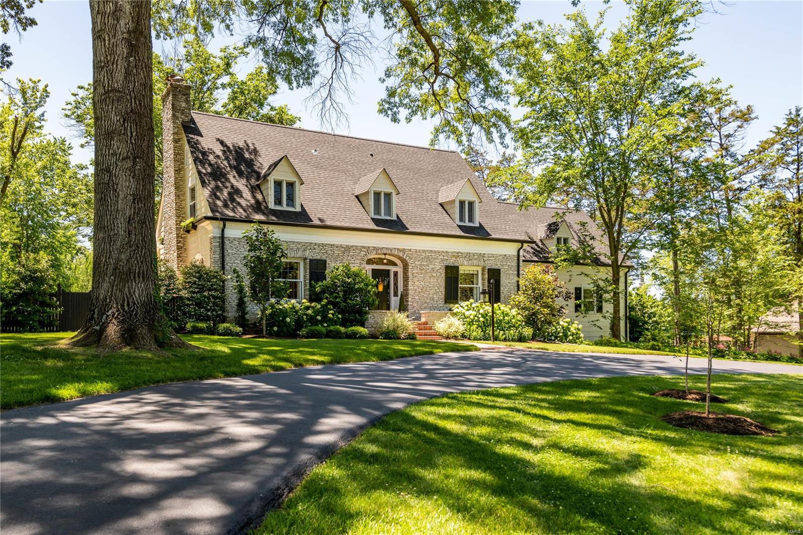You will fall in love with this stylish Ladue home designed for entertaining- located on one of the most sought-after streets. Every detail of this totally updated house will delight you from the chic interior design to the gracious features like leaded glass French doors & windows.  Spacious living room with fireplace & an adjoining sunroom with French doors that lead to the terrace. The dining room is open to the kitchen for modern living. The kitchen is graced with a La Cornue gas range with custom hood, marble & wood counters, breakfast area, Subzero fridge & 2 dishwashers. Guest bedroom with full bath on the main level. The master bedroom has 4 closets, fireplace & updated bathroom. 2nd floor laundry room. 4-year old saltwater pool with cool deck & a cabana with fireplace. Outdoor BBQ with gas & charcoal grills. Plenty of backyard space for recreation. Lower level with half bath, kitchenette, walkout & plenty of storage. Oversized 2-car garage.