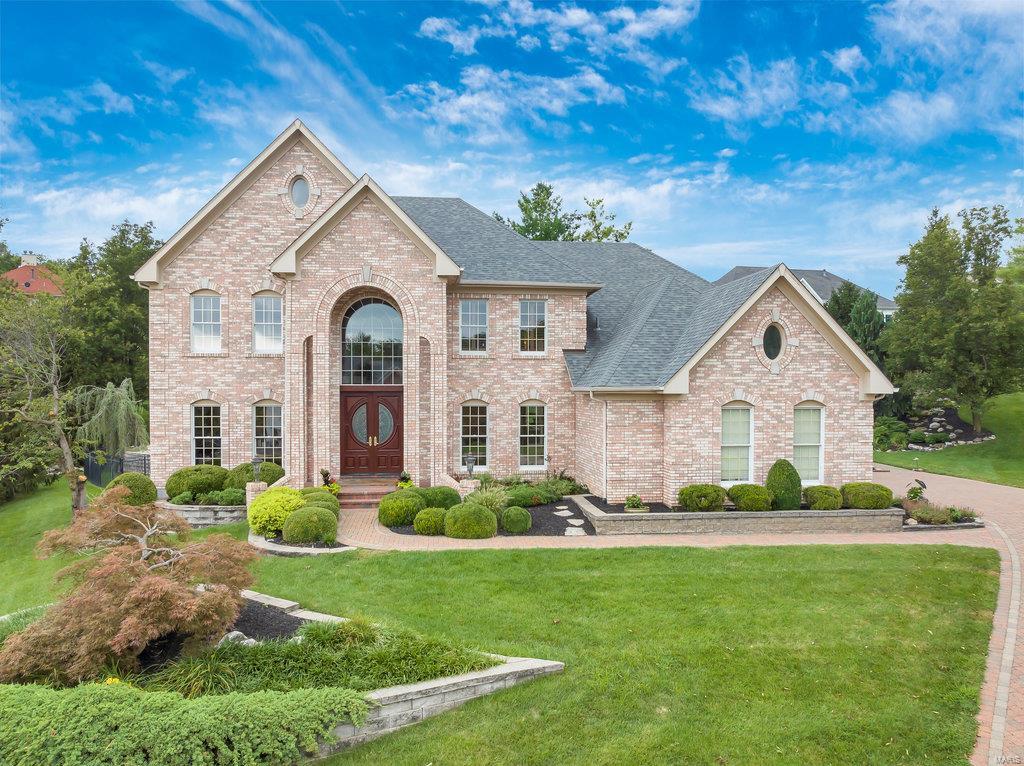 Stunning 5-bedrm offers incredible living w/unparalleled elegance. Youre greeted by views from every window, showcasing serene pool, tranquil waterfall, pond filled w/exotic fish. Formal office, dining rm, & family rm boast exquisite woodwork, setting the stage for an elegant & sophisticated lifestyle. Kitchen true showstopper, flooded w/natural light. Adjacent hearth rm provides cozy space for relaxation. Main flr includes convenient laundry rm, walk-in pantry, primary bedrm w/en-suite bthrm. 2 staircases lead upper level, adding touch of grandeur to home. Master bedrm boasts incredible en-suite bathrm, renovated w/stunning shower & gorgeous closet. Hallway leads to 2 bedrms w/Jack & Jill bathrm & 4th bedrm w/bathrm. Lower lvl incl spacious family area, custom bar, workout rm, & bathrm. Backyard oasis, perfect for escaping & unwinding. Enjoy the soothing sounds of the stream flowing down to the fish-filled pond, this backyard retreat offers the ultimate in relaxation & tranquility.