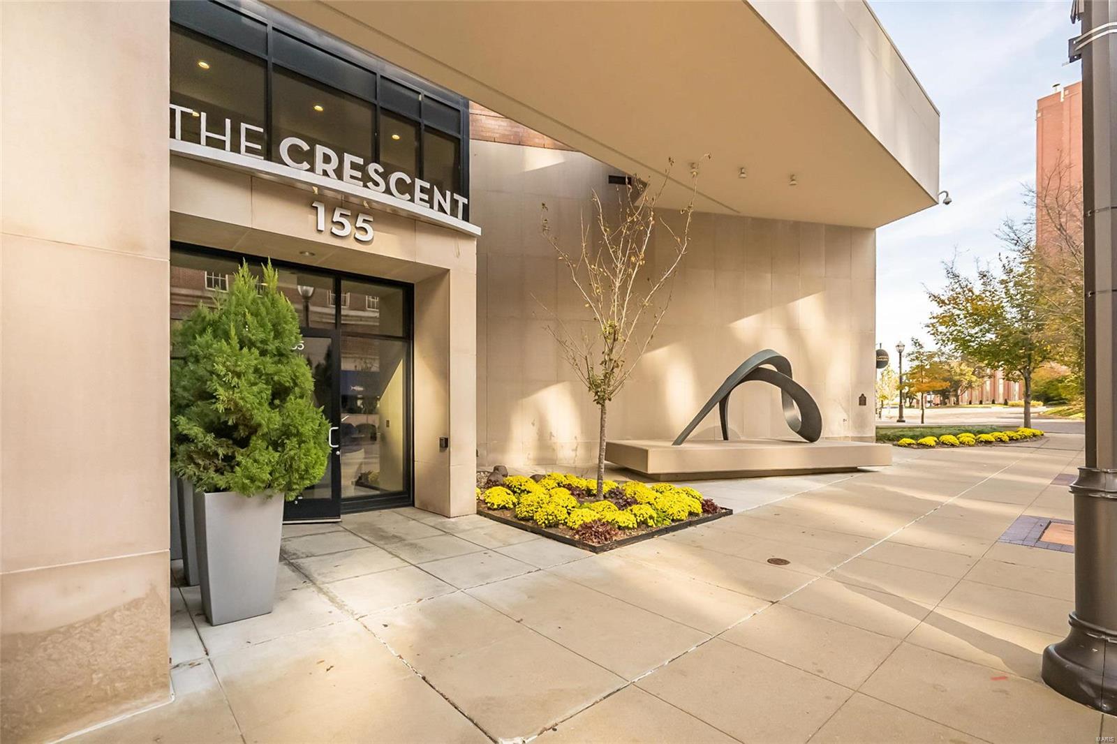 Located in Clayton's prestigious Carondelet Plaza, this elegant 1-sty condominium redefines luxury living. Over 2800 sf of living space enhanced by distinctive design elements & superior craftsmanship throughout including marble flooring, 10’ ceilings, elaborate millwork & integrated sound system. Impressive entry foyer highlighted by architectural pillars leads to formal living room with marble fireplace flanked by mirrored display cases & dining room with atrium doors that open to private terrace. Designer kitchen with glazed cabinetry, marble countertops & commercial grade appliances adjoins light-filled breakfast room with wet bar & built-in bookcase. Sumptuous master bedroom suite features 26’ x 10‘ closet, lavish bath with expanded shower & adjacent study with custom built-ins. Guest wing includes a 2nd ensuite bedroom, laundry & private entrance. Full-amenity building with 24-hr concierge service, valet parking, club/media room, fitness center, dog park & secure & heated garage. Location: Upper Level