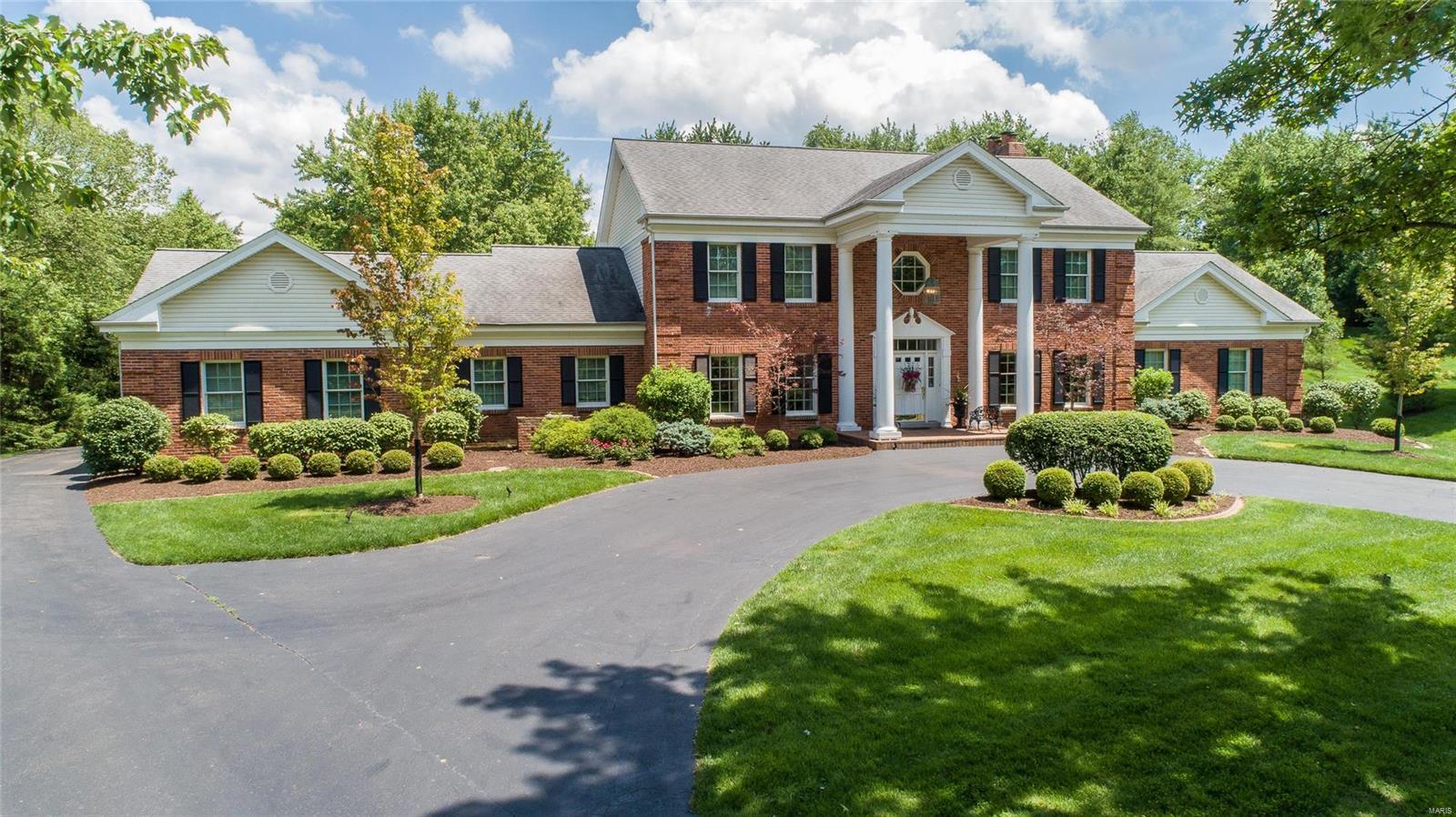 Stately 5 BR, 5 BA Colonial on quiet cul-de-sac with pool and pool house on 1.1 acre private lot with 5,600+ square feet of living space that includes a fun partially finished lower level with wet bar. The main floor boasts extensive mill work and includes a gracious main floor updated master suite with his and hers walk in closets and luxurious bathroom with granite counters and separate tub/shower. The living room and family room with wet bar flow seamlessly into the beautiful gourmet kitchen with breakfast room, built in planning desk and large island. A large deck off the kitchen overlooks the spectacular grounds and pool. The dining room, main floor laundry, 1/2 bath and 3 car garage complete the first floor. The second floor includes 4 spacious bedrooms and 2 full baths. The gorgeous pool and pool house take entertaining to a whole new level. The pool house includes a full bath, full kitchen and sitting/serving area as well as plenty of room for outdoor seating and dining!