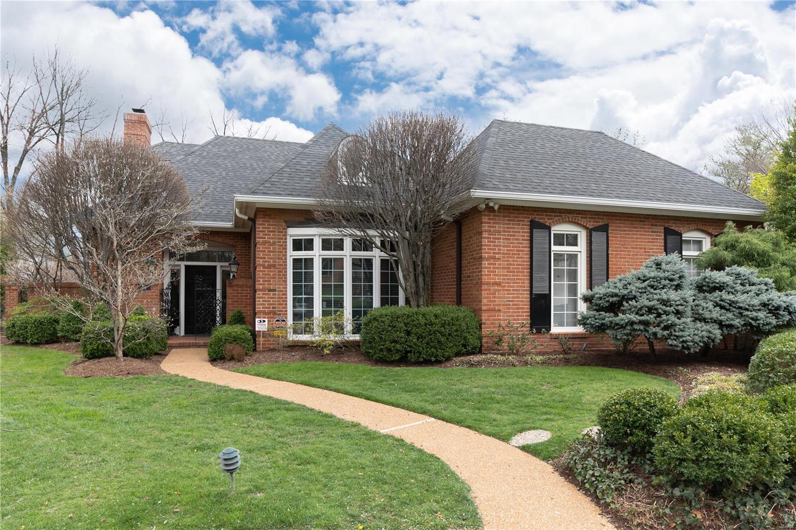 Do not miss this opportunity to live in a most desirable area in a 3 bed, 2.5 bath villa located on a cul-de-sac.  A roomy entry leads to a gracious living room with fireplace and opens to the large den offering easy flow for entertaining. Two private brick terraces. Spacious dining room with bay window and western exposure.  Fully equipped bright kitchen with center island, granite counter tops, and storage galore.  Kitchen is open to hearth room with fireplace and built- in bookshelves.  Main floor ensuite master bedroom with built- in cabinetry.   Master bathroom has extra storage and walk- in closet. Second floor has 2 bedrooms, 1 bath and loft office with built-in desk.   Tastefully landscaped.  Complete house generator.  Storage cabinets in heated garage can be removed to allow for 2 car garage as built.  2 fireplaces and chimneys are sold in their present condition, with Seller to make no repairs nor provide credits.  Charming and gracious, a must see!