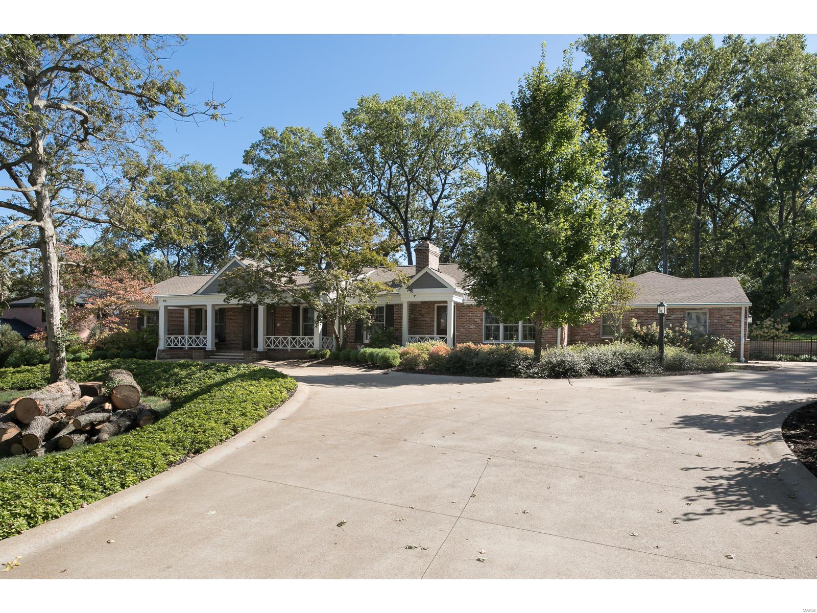 Built in 1955 but completely renovated, this home is a bright and spacious haven. Beautiful wood flooring flows through each room of this house, from the front entryway to the expansive great room and family room complete with fireplaces and skylight. An enormous open kitchen has all the space you need to test your skills. A huge island counter provides a wonderful work space. A breakfast nook with built-in seating is so convenient. The laundry room provides storage space and is beside the 3 car garage.  The master BR suite has lots of natural light.  A large walk-in closet and master bathroom with 2 sinks, a tub, and a shower complete the space. Two more BR on the main level each have their own bathroom. A finished LL has another BR plus more room for entertainment.  Outside, there is a gorgeous covered patio with vaulted ceilings and a fireplace sits beside a beautiful pool.  Multi-level landscaping turns this backyard into a cozy oasis. This home is a charming & bright space. Additional Rooms: Mud Room
