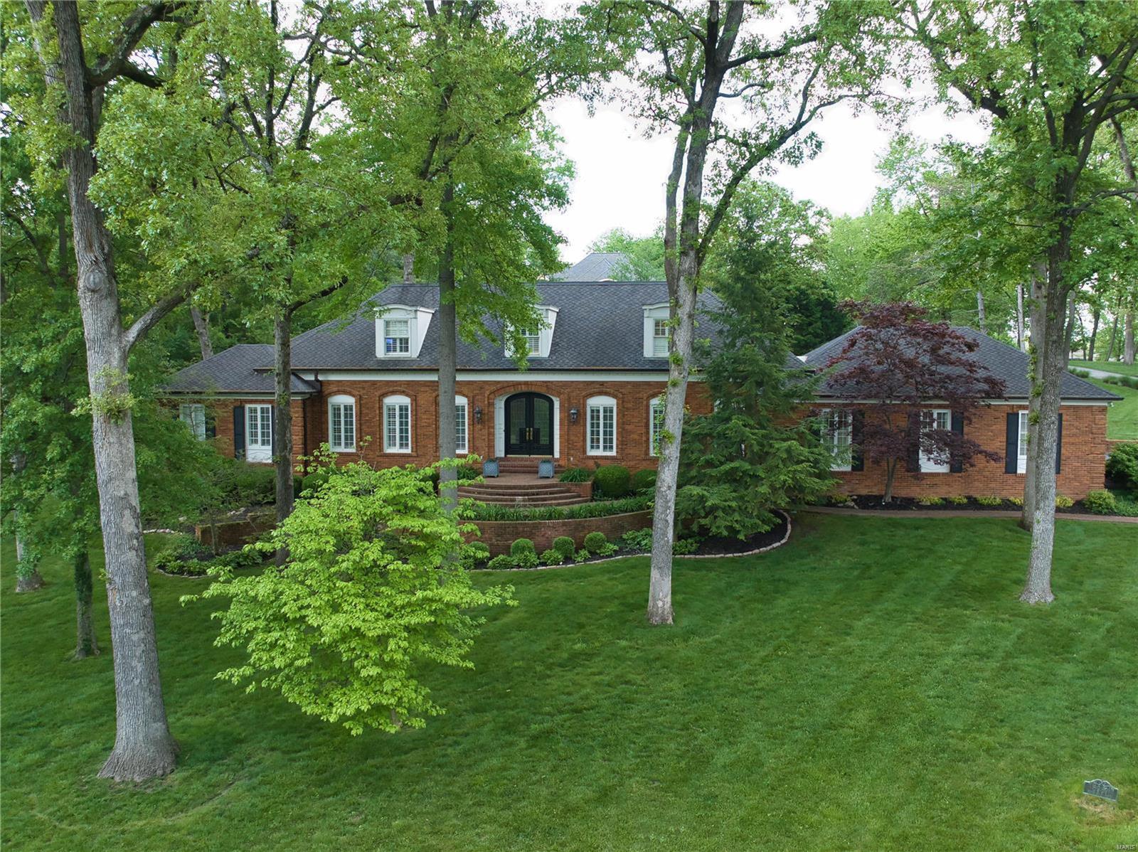 Welcome to a gorgeous Ladue 1.5 story residence on a 1.28 lot with a salt water pool, patio, screened porch and a back yard with space for outdoor activities.  The family room is an inviting gathering space, with a wet bar, gas fireplace and vaulted ceilings. The open layout to the living room and formal dining room enhances the flow of the home. A spacious kitchen features quartz counters, Viking appliances, center island, custom cabinetry, and convenience to laundry room. The main floor master suite offers a retreat-like ambiance, coffered ceilings, two walk closets, jet tub and separate shower. An office on the main level has built-ins, and attached full bath makes it a guest suite. Upstairs are 4 bedrooms with ample closets. Two of the bedrooms have ensuite and two have jack and jill bathrooms. The lower level is finished for entertainment in rec room with fireplace. Large unfinished space for any use, abundant storage and full bath. The three-car garage provides extra storage. Additional Rooms: Mud Room