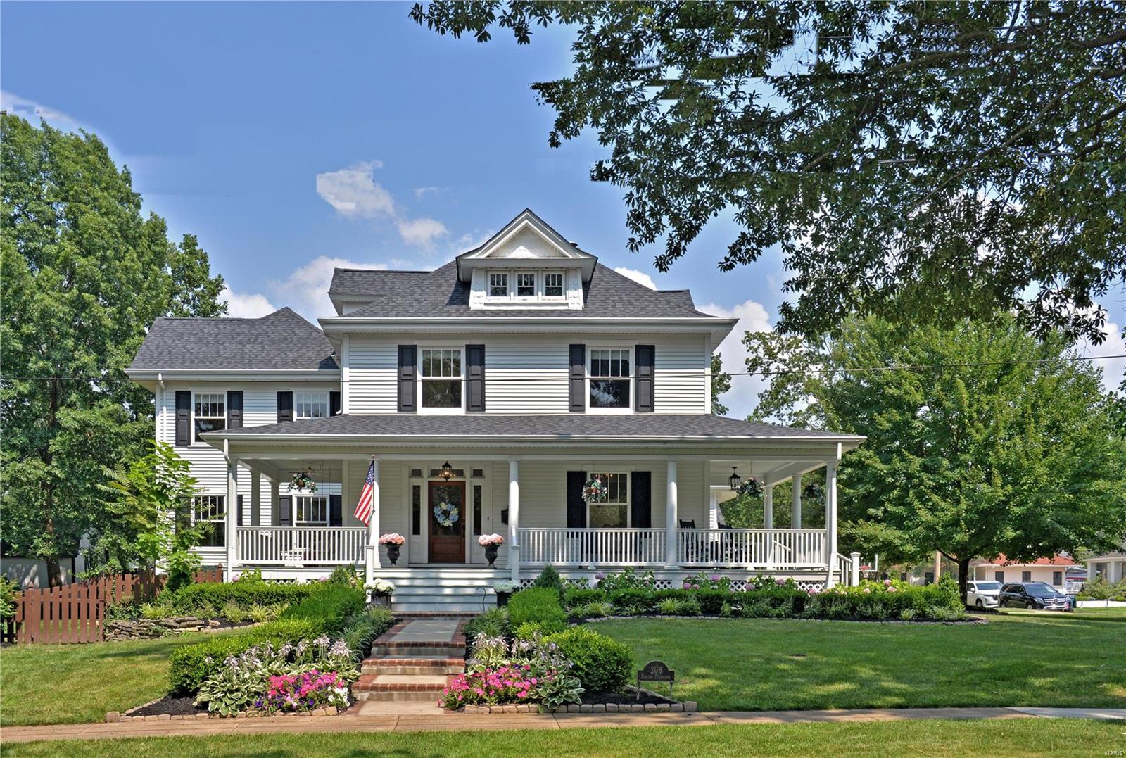 Grand Victorian located in sought after historic district of downtown Kirkwood.  Set on a rare double lot--large enough for a pool! Unbeatable curb appeal with sweeping wrap-around porches, 5 bedrooms, beautifully updated white kitchen, and gorgeous millwork and hardwoods.  Large deep-pour basement with multiple egress windows and both open and seating areas.  Additional bonus spaces include finished 3rd floor, large mudroom/office, lovely patios and outdoor entertaining areas.  This house boasts exquisite attention to both interior and structural details. Additional Rooms: Mud Room