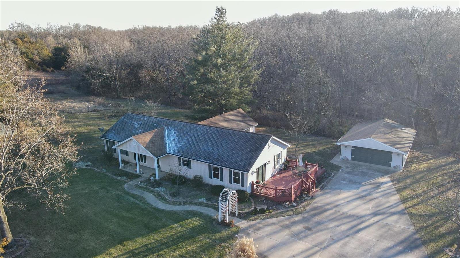 If you’re looking for a place 45 minutes outside of St. Louis that offers nature, privacy and chance for you and your family to unwind then 2200 Farris County Rd is your place.  The 5-bedroom/ 2bath home, extended 2 car garage and 5 horse barn sits on 61.82 acres of woods and prairie.  The property boasts walking trails, gardens, and multiple deer stands giving visitors the chance to disconnect. The property backs up to 107 acres of St. Charles County Town Park which limits other builders.  There is potential for development of 14 custom homes with 3 acres lots.  Copy and paste this link in browser to view satellite footage of this property: https://app.frame.io/presentations/b69de8a8-4ff7-4903-bb65-d54c31ec2dba

Duplicate listing of (MLS#21041496 )"