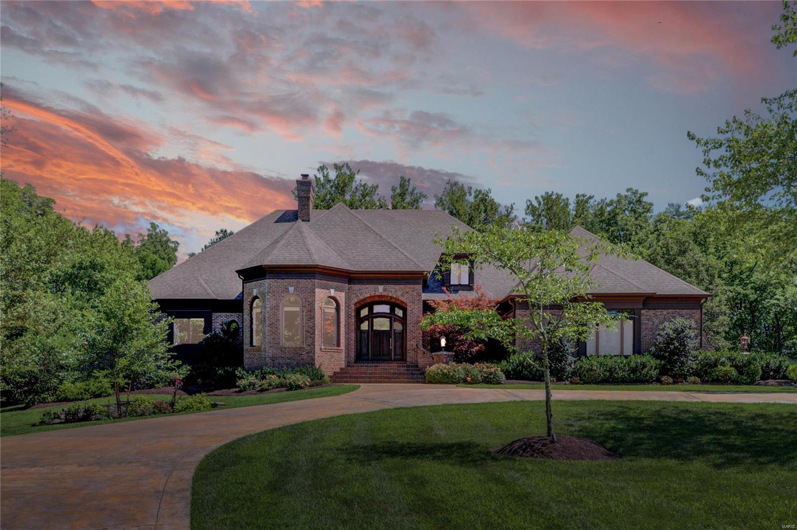 Majestic Botanical Garden Park-Like Setting in a Gated Private 3 Home Cul-De-Sac. Meticulously cared for custom built atrium ranch w expansive floor to ceiling palladium windows. Stunning views overlooking the groomed wooded green gardens. Designer gourmet kitchen w custom cabinets, granite counters, walk in pantry & built-in top of the line appliances. Newer addition incorporates the main floor laundry room/office w yet more storage & workflow functionality. Coffer & waffle ceilings, custom mill work, 5 fireplaces & built-in display cases add to the warm character & charm of this exquisite home. Main floor master bedroom suite w sitting room & expansive master bath w heated floor. Finished walk out LL w great room, bar & stone wood burning fireplace. Fitness room w sauna, steam/shower. Situated on a 1.33-acre lot w spa, deck & patio w fire pit.  Oversized 3 car garage with an abundance of storage cabinets. This home will not disappoint!