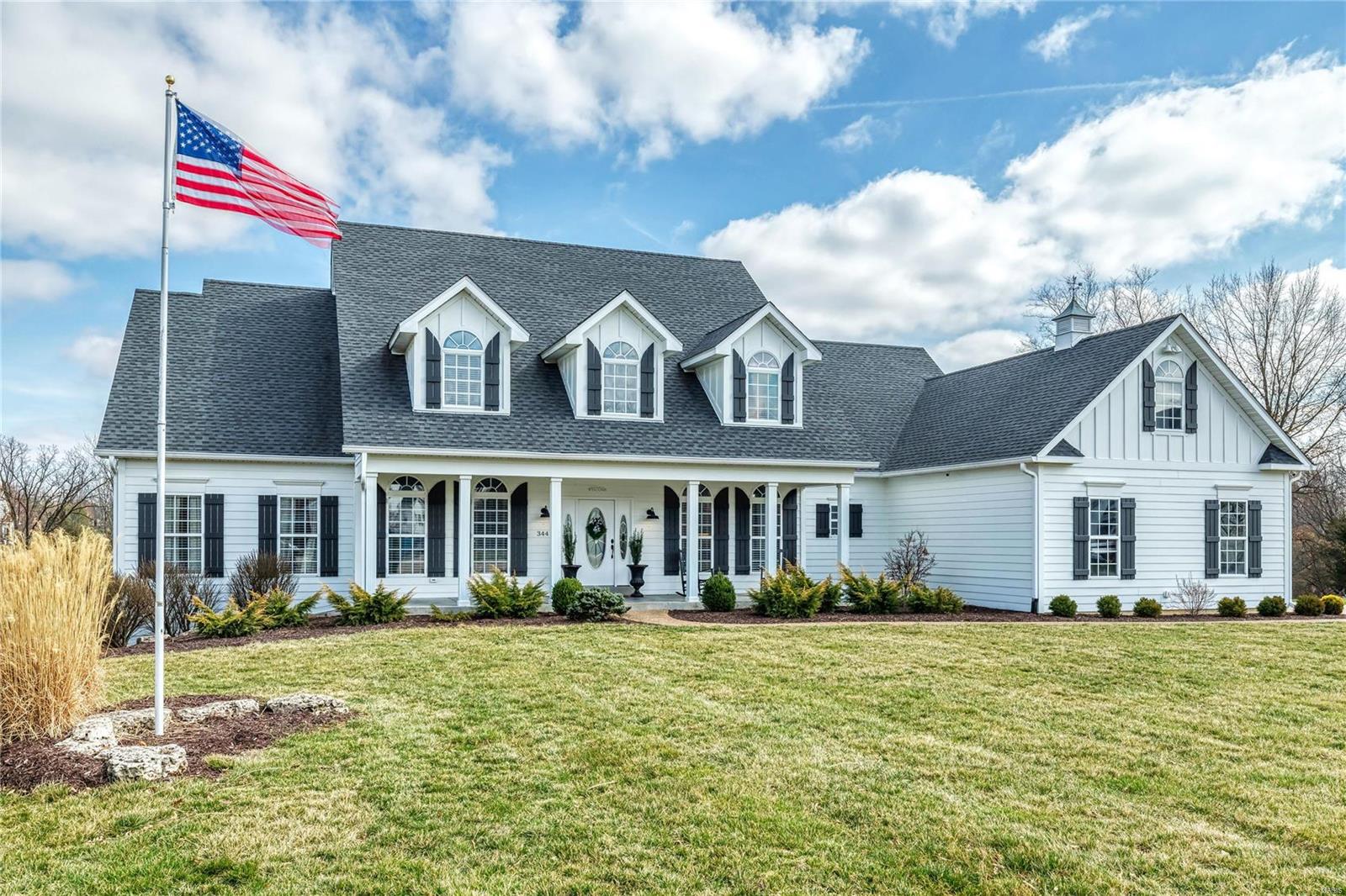 Picture perfect Cape Cod. This exceptional 1.5 Sty features light-filled rooms with oak hardwoods, soaring ceilings & full-height Palladian windows that offer expansive views of the lake & wooded grounds. Impressive 2-sty foyer leads to formal dining room, private study & stunning great room with marble fireplace & dramatic wall of windows. Designer kitchen with quartz countertops, 42” white cabinetry, stainless steel appliances & butterfly center island adjoins breakfast room with convenient planning center & vaulted hearth room highlighted by marble fireplace. Primary bedroom suite with luxury bath with freestanding tub provides a relaxing retreat. The 2nd floor extends the living quarters with 3 additional bedrooms, 2 with Jack n’ Jill bath, & hall full bath. Lower Level includes recreation room with wet bar, game room & media room plus office & guest suite. Situated on a 1.2-acre cul-de-sac lot with 2 decks, 2 patios & 4-car garage. Stocked lake & walking trail are just steps away.