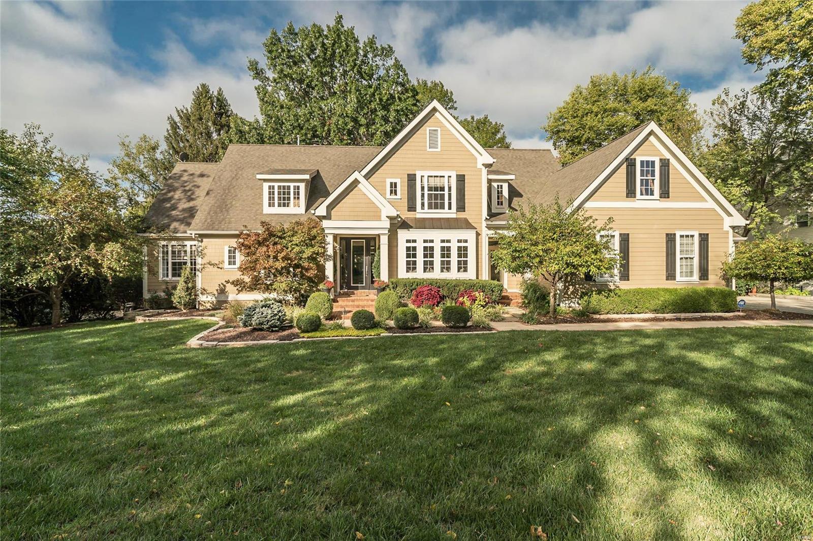 Magnificent 17 year new 1.5 story showcases 5 bedrms, 4.5 baths, 7,147 incredible finished sq ft w/fabulous LL, pristine condition, unparalleled distinction, exceptional recent high-quality updates. Handsome exterior w/elite Hardie cement siding, 3 car garage w/1,276 total sq ft. Impressive construction options Incl 2 laundries, 3-zoned HVAC, wide rear staircase, gorgeous site-finished wood floors w/9" base, executive millwork & built-ins, 6-panel & opaque glass drs, woodbrng fireplace w/slate surround, custom interior window cutouts, 2nd front entry. Stunning kitchen w/Red dragon granite & mahogany counters, premium stainless appliances. Exquisite vaulted master suite w/walk-in closet, personal covered deck & striking bathroom w/jet tub, built-in linen press. Composite deck overlooks spectacular .53 acre level private parklike lot lined w/mature trees & boasting professional landscaping, exterior lighting, inviting patio, outdoor fireplace... an oasis of relaxation welcoming you home!