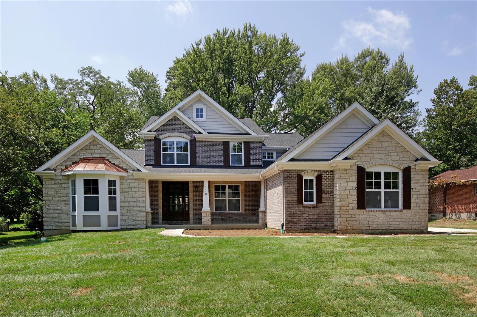 Another just completed new custom home by Helmut Weber Construction Co in wonderful tree-lined Stoneleigh Towers in Ladue Schools. 5 BD, 4.5 baths, 1.5-story plan with approx 4700 SF of living space on 3 levels.  Enjoy the first-floor coffered master suite with luxury bath featuring double granite vanities, large walk-in shower plus a soaking tub, and a spacious closet.  Other amenities include a white center island granite kitchen with breakfast bar plus gas cooktop and KitchenAid stainless appliances, wood floors, a 30-year architectural roof, 16' x 16' covered outside patio area with vaulted wood ceiling leading to a beautiful level, wooded rear yard, and 3-car drywalled garage.  Notice the wood entry foyer, main floor tiled laundry, 9' ceilings on the main floor and 9' basement pour, security system, zoned HVAC, and 2 water heaters.  The upper level has 3 BD, 2 baths, plus a family room with wood floor.  Wonderful lower level has rec room, 5th BD, and 4th bathroom.  Welcome Home!