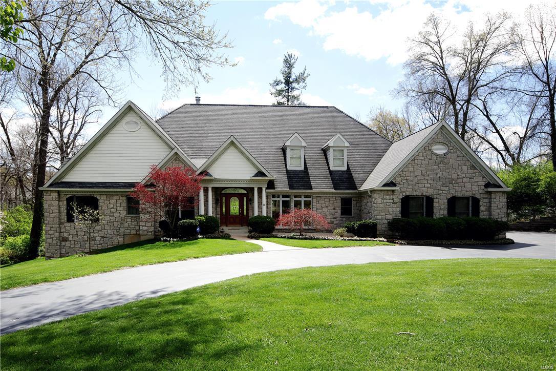 Light-filled atrium ranch on private lane in Ladue School district.  15 yr old home offers soaring ceilings, Pella windows, hardwood flooring and open spaces throughout.  The gourmet kitchen with custom cabinetry, granite countertops, hardwood flooring and Viking stainless appliances opens to the family/hearth room with gas fireplace and walkout to deck overlooking backyard.  A dining rm with climate controlled wine rm is perfect for entertaining.  The main floor master suite is complete with 2 walk in closets, gas fireplace, walk out to second deck, and large bath with jetted tub and large glass shower.  2 other bedrms with Jack and Jill bath, mudrm, guest powder and utility half bath are also found on the first level.  The lower level offers a large rec room, 2 bedrms with large windows to the backyard, hall bath and plenty of unfinished space.  A 3 car garage, patio off the lower level and more complete this beautiful property.  This floor plan is typically not found in this area. Additional Rooms: Mud Room