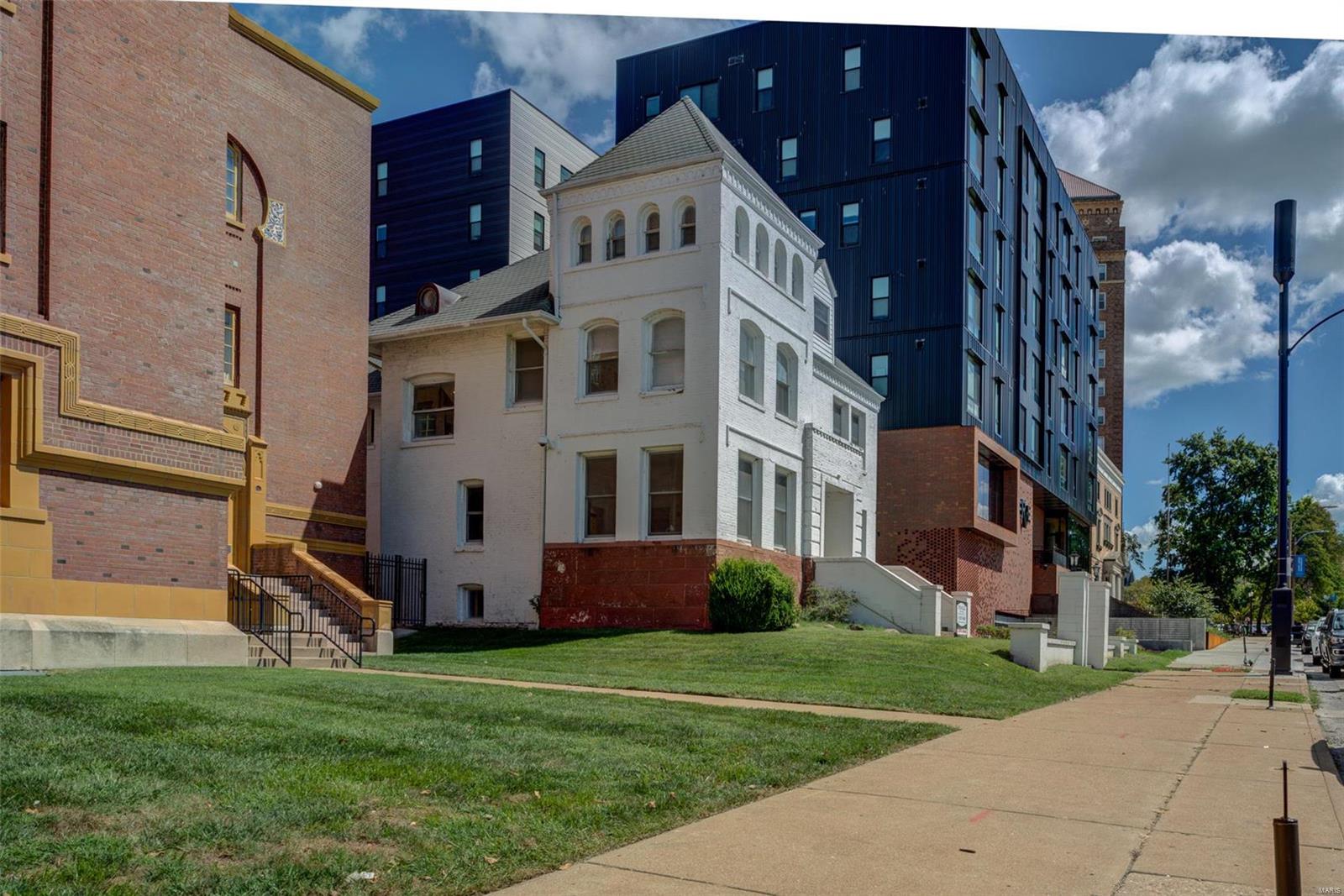 Professionally Managed 12 unit apartment building on Lindell right across the street from Saint Louis University, and RIGHT next door to the MOOLAH LANES. This property consist of 8 one bedroom units and 4 studio apartments with secure front entry, beautiful historic entry foyer/lobby, on-site laundry facility, and individual storage units. Each unit has hardwood floors, updated kitchens, and full baths. This front entry features historic natural wood work. The property has newer HVAC, copper plumbing, pvc stacks, updated electrical panels with circuit breakers, and newer hot water heaters. Newer roof shingles and some newer windows. Walking distance to the CWE, The Grove, IKEA furniture store, and the newly developed Foundry.