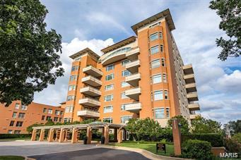 Your search has ended! This stunning, sophisticated, spacious condo is in "The Residence", one of Clayton's premier and most sought-after condo buildings. Gracious spaces for entertaining, dining & living. Grand living room area with gas fireplace, hidden wet bar & custom built-in shelving. Great light throughout. Elegant formal dining room. High 10 ft ceilings, hardwood flooring, some luxury carpet, and wide custom moldings. The Primary suite offers a grand size bedroom, spa-like bathroom, enormous walk-in closet & custom built-ins. Two Spacious private guest bedrooms with full baths. One can also be an office. Formal powder room. The SIGNATURE room is the kitchen area that includes a large island, a breakfast room, and a sitting area opening to a private terrace. In unit laundry room. 2 deeded garage spaces and a private storage locker in the heated garage. Building amenities include a 24-hour door attendant, party room, exercise room, elevator to all levels, and an inground pool. Location: Corner Location, Suburban