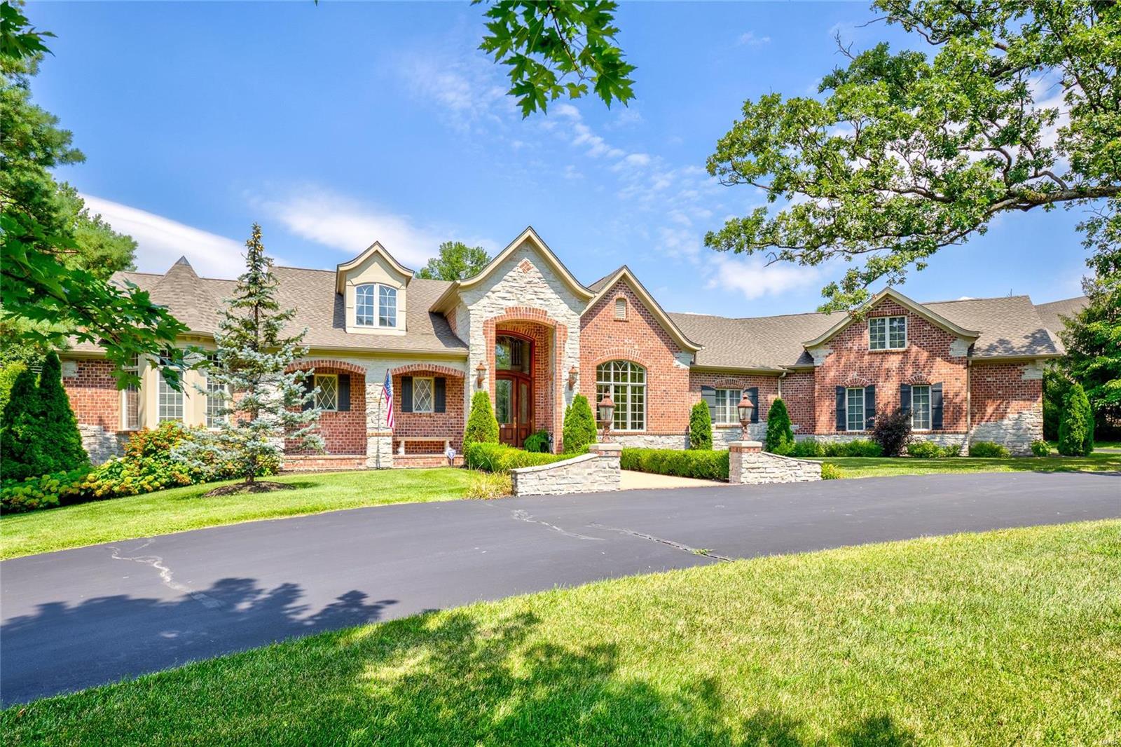 Fall in love with this stunning 5+bedroom, 7 full 2 half bath home on Holiday Lane! From top to bottom this home is fully loaded; wood floors, walls of windows, premium crown moldings, and all the right spaces to entertain your favorite people in style! The bright spacious 2 story entry opens to the dining room with barrel ceiling and the living room with french doors opening to the pool area. The breakfast room with coffered ceiling, hearth room with a wood burning fireplace, living room with gas fireplace that connects to a stunning study, enormous master bedroom suite all walking out to the spectacular pool area. The large open Chefs kitchen is ideal for family dinners and preparing for large groups and leads to a first floor laundry room with built ins. The Hearth room opens to the bright sun filled 1,191 sqft pool house with heated tile floors, beautiful bar, entertaining area with french doors to the patios and pool. Some Accessible Features Additional Rooms: Mud Room