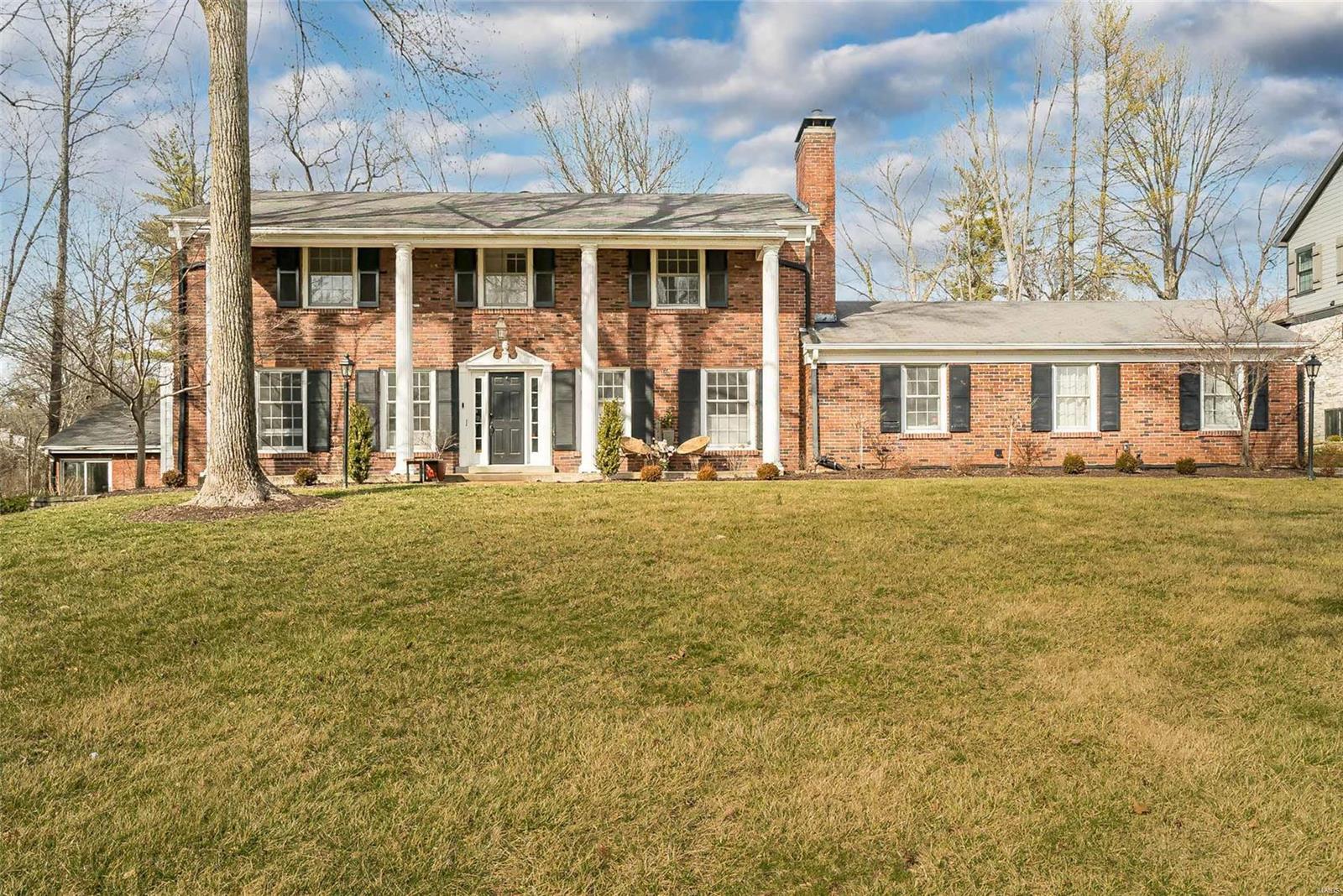 SUN open house cancelled. With over 3,700 sf, this 5 bed, 3.5 bath home sits on 1.048-acre lot on a tree-lined private Ladue lane. Modernized with NEW hardwoods on main/upper levels, custom slate flooring in entry, can lights, fans and updated secondary bathroom. Feature walls added to dining room and primary bedroom. Living room overlooks wooded side yard and opens to the large dining room and private study with built-ins. Kitchen features gas cooktop, double ovens, & sunny breakfast room that overlooks covered/outdoor patio and backyard. Family room features wood burning fireplace. Spacious main floor laundry. Show-stopping 60x30 pool house with 18x40 indoor swimming pool! Spacious primary bedroom suite w/16x9 walk-in closet. Four secondary bedrooms + two additional bathrooms round out 2nd fl. Lower level offers a wonderful opportunity to finish to your liking. Space for a large rec room, dressing rooms & plumbed for a full bath. Don’t miss this opportunity to call #2 Clerbrook home!