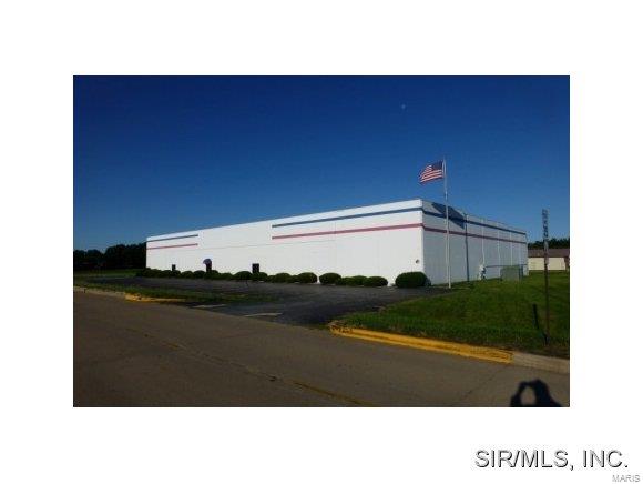 This tilt up concrete building has approximately 30,150 s.f. of space sets on about 3.5+/- acres. The main floor is 24,800 s.f. with a 3,000 s.f. mezzanine, and another 2,350 s.f. of second floor office/support space.  There are 3 dock doors(2-10â & 1-14â high) and 2 overhead doors(14â high), ceilings are about 20â, electrical is 800 amps three phase and single phase. The building was extensively renovated in 2006. Some Accessible Features