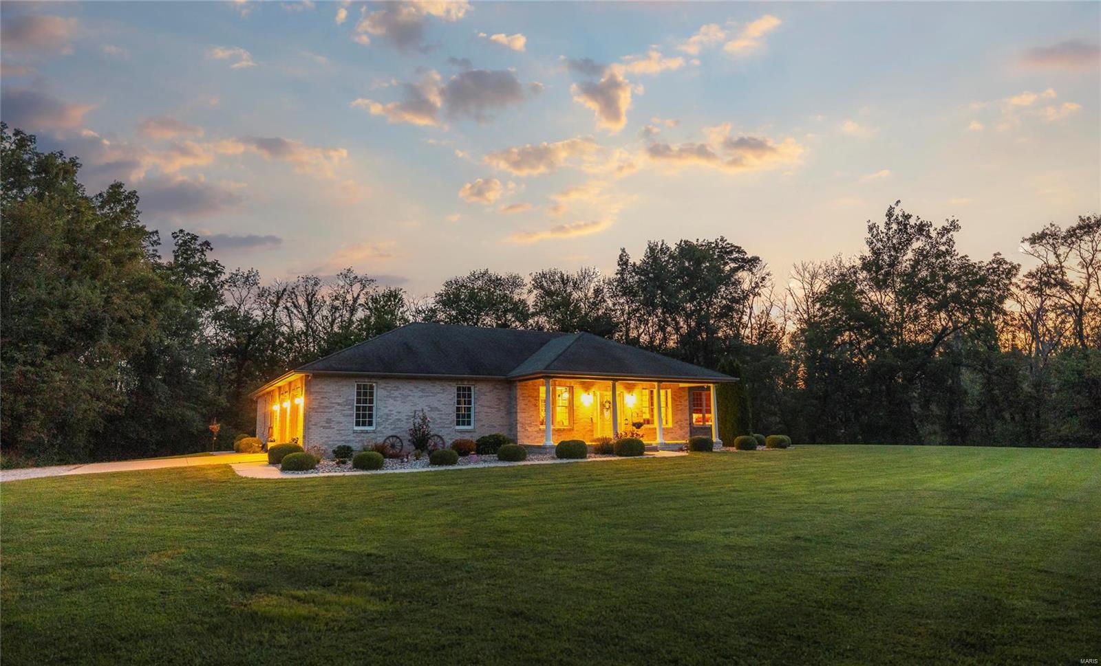 E. Kirsch Rd in St. Jacob Illinois is a great representation of country living while offering a perfect balance of connectivity.  5 minutes from highway 270, the 55 acre country estate is situated perfectly in Madison County with easy access to Edwardsville, Fairview Heights and St.Louis.  The home consists of 2,249 square ft and offers 3 bedrooms and 2 baths and offers a convenient  open floor plan bringing everyone together for cooking, dining, and gathering.  A stone fireplace ties this all together.  The property features a 40x60 shop barn complete with concrete floors and patio space.   Acreage is a mix of mostly timber, but some tillable ground. Plenty of wildlife for any hunting enthusiasts.  There is a current $64,000 bid on file to log the property.  Kirsch road is a quiet road that compliments the outdoor experience.  A must see for anyone searching to get out in the country.