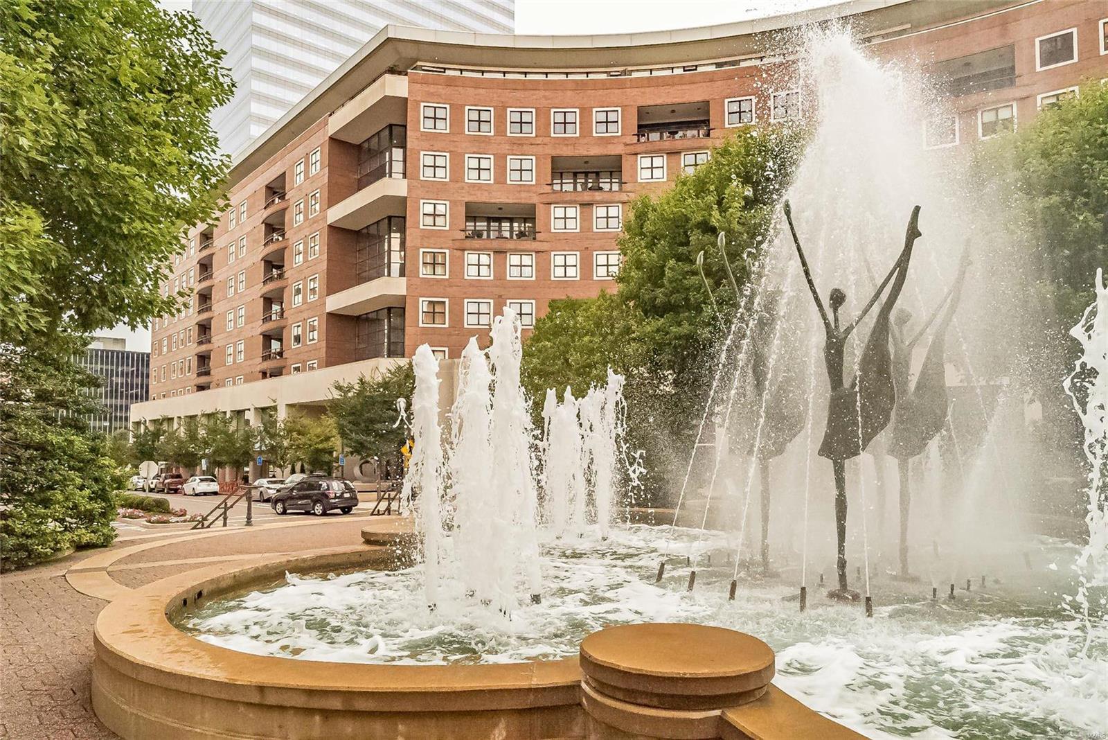 This sleek, sophisticated condo is located in The Crescent, a luxury high-rise in the heart of Clayton. Located steps from gourmet restaurants, shopping and personal services, building amenities include 24/7 doorman service, valet parking, on-site manager, concierge, clubroom with catering kitchen, fitness center, resident garden terrace, dog park, heated garage parking and more. This corner unit, with its wall of windows, is filled with natural light and offers views to the north and east. The open floorplan, gas fireplace, surround sound, and Sub-Zero and Wolf appliances are superb for entertaining. The master suite includes a lavish bath, custom walk-in, and access to the large, covered terrace. Guest bedrooms share a Jack & Jill, and a spacious library/office offers the perfect retreat. This condo is conveniently situated very near the private elevator to your reserved parking spaces. Designer lighting, custom cabinetry and closets throughout. Complimentary valet parking in front. Location: Corner Location, End Unit, Upper Level