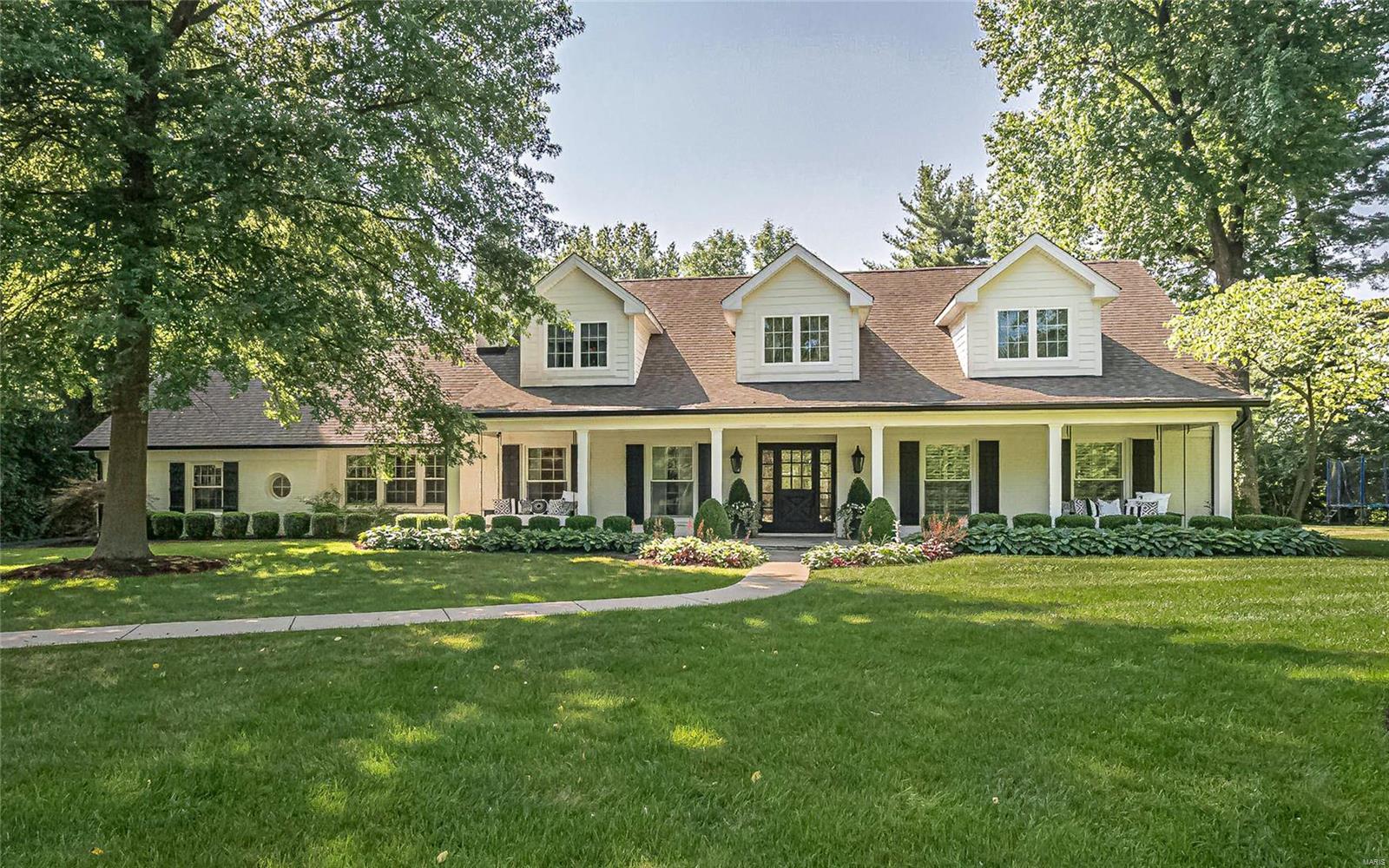 Sophisticated, light filled and totally updated New England style 1.5 story residence that was totally transformed and added on to 5 years ago. Located at the end of a private lane and on the cul-de-sac, this home offers a wonderful open floor plan perfect for casual elegant living.
 8" french oak floors throughout main level, Main floor master suite with luxury bath and large walk in closet. The chef's kitchen has white custom cabinets, center island, carrera marble counter tops, and all the "must have" appliances. Spacious breakfast area, vaulted hearth room with beam ceiling and gas fireplace, formal dining room with fireplace, cozy den with 3rd fireplace, butler's pantry, main floor laundry and formal powder room.
Upstairs you will find 3 bedrooms, 2 full baths and sitting room.
Lower level is partially finished and has ample storage area. Relax on your patio and enjoy your private inground pool this summer! 
2 car garage, inground sprinkler and professionally landscaped.