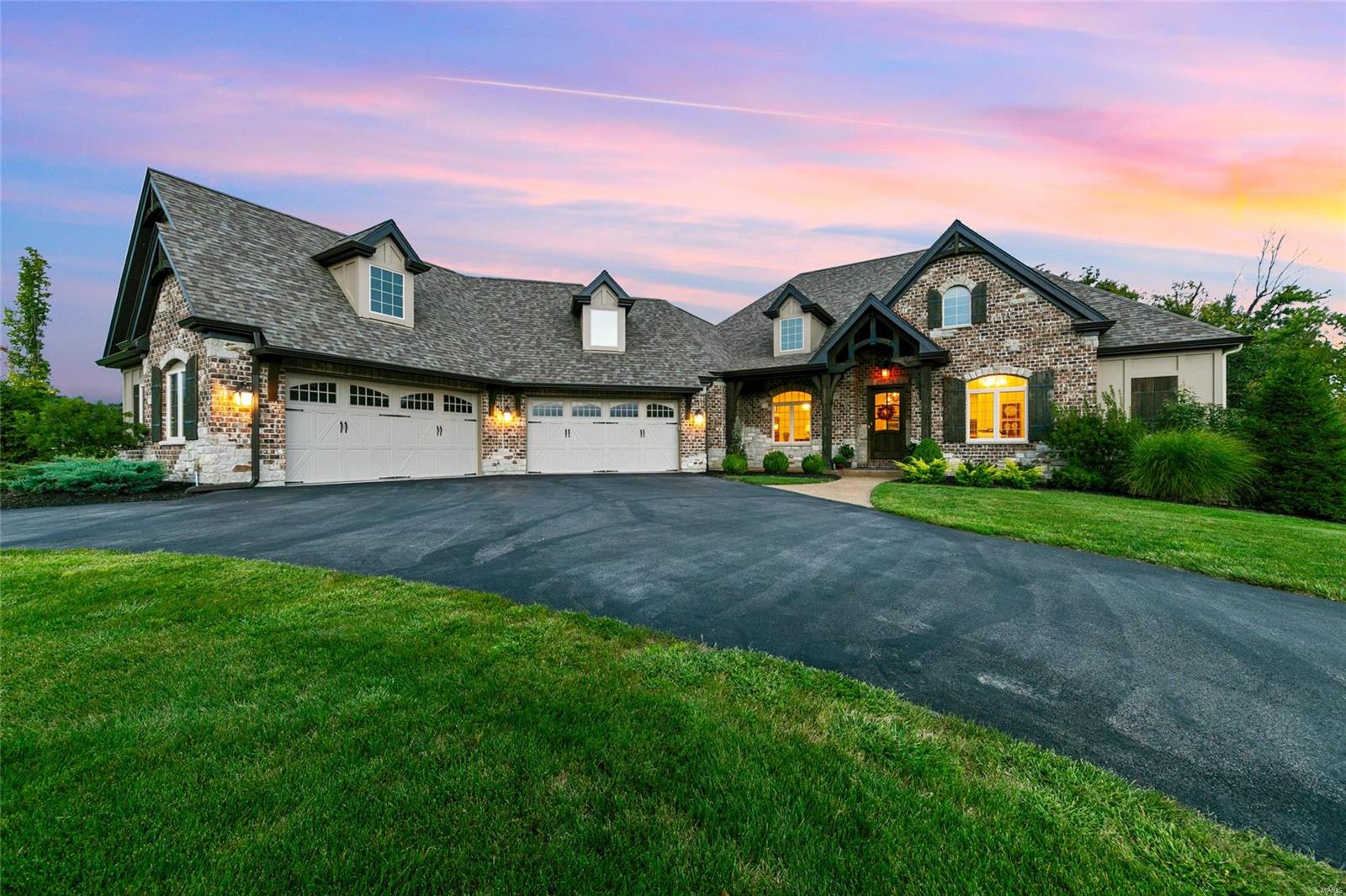 Amazing atrium ranch w/character & detail rarely in new construction. A welcoming porch transports you into the foyer with adj. study. A chef's kitchen is a dream w/elegant counters, exceptional cabinetry, and hidden pantry. The dining/living rm. with stone FP has exposed beams that go with the natural setting you will view from the covered deck. This floor also features the main mstr. with  tray ceilings, custom closet and rich bath. The second mstr. offers an ensuite bath with soaking tub. The mud room leads to the garage with ample space for 4+ vehicles. Reach the LL on the wood finish staircase into an entertainers paradise. Relax in the family room w/FP or walk through the stone arch into the bar. Guests will be impressed with with cabinets, wine fridge and bar. The 3rd/4th mstr. suites continue like the highly appointed finishes upstairs. Walk out to enjoy the outdoor FP with room for comfortable seating as you overlook the 3 acres that are the setting for this magnificent home. Additional Rooms: Mud Room, Wine Cellar