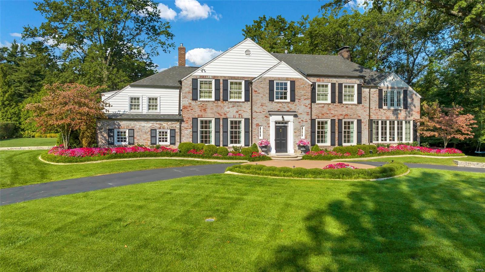 Stunningly updated two & half story brick home situated on a beautiful lot in Ladue's prestigious Briarcliff subdivision. No expense has been spared on this charming four bedroom, 4.5 bath home. Featuring a grand entry, formal dining, spacious living rm, a gorgeous family room with tons of natural light & custom built ins, an in-laws suite, beautifully updated kitchen & remodeled basement. The primary bath as well as J&J bath have been completely renovated. Primary Suite impresses with the updated bath, sun-filled sitting room & dual closets. Professionally landscaped yard & paver patio opens from numerous french doors. Finished LL has Rec Rm, built-in bookcases, full bath, & storage. All new shutters in '22, brick exterior painted in '23, a whole home makeover by Denise Fogarty interiors, extensive surveillance has been installed, newer HVAC and water heater, most windows replaced with Anderson Windows and too many more updates to mention here, please see attached upgrade sheet!