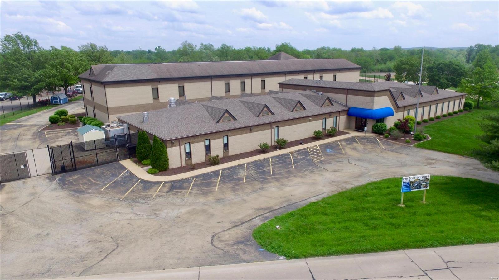 This high quality office campus is located in Farmington Industrial park located just off Hwy 67 approximately 70 miles south of St. Louis. The campus is situated on 6.41 acres and consists of three buildings including a one story office building with connecting two story office building consisting of approximately 38,400 square feet. The third building is a separate 5,142 square foot childcare facility with outdoor play area. The onsite amenities include an employee cafeteria, elevator, secure parking lot, on-site daycare and backup electric generator. There are two at-grade loading docks. This property is zoned OP-1 which allows flexible use of this space including business offices, home health care, hospitals, medical clinics, residential nursing/residential care assisted living facilities and more. Location: Industrial Park