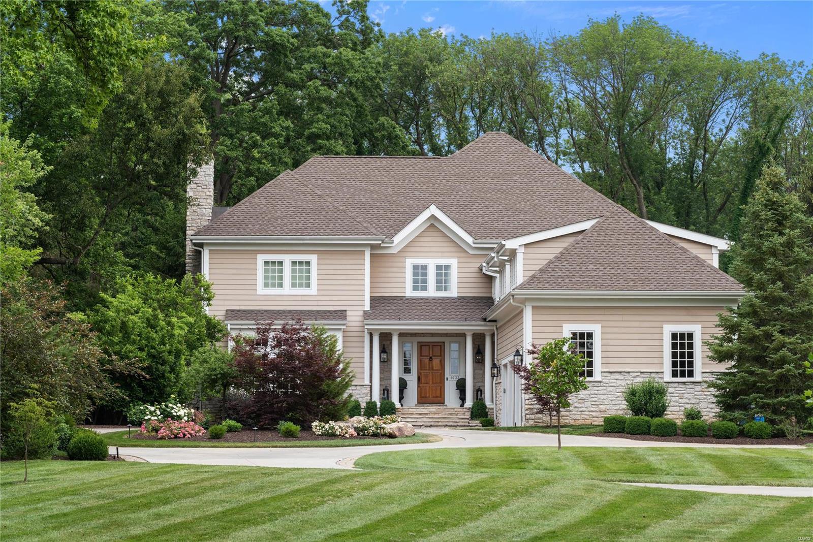 Truly an incredible opportunity for a stunningly impressive residence located in the heart of Ladue. This meticulously maintained home contains over 5800 sq ft, plus a finished lower level and a pool house. The home is situated on approximately 1.33 acres at the end of a private street. 5 bedrooms, 8 bathrooms (incl. pool house), 10 ft ceilings throughout and 11 ft in the primary bedroom. Gourmet kitchen with Viking appliances, great room with custom millwork, & custom woodwork throughout. All bedrooms have walk-in closets and ensuite baths. Bonus sitting room upstairs. The private backyard oasis is an entertainers dream! Stunning stone fireplace, gas fire pit, the pool and spa are surrounded by an impeccable pool house with a kitchenette, sitting area and a full bath. This home displays a "simple elegance" and is an absolutely "must see" for your most discerning purchaser.
*Listing states BOM bc it went from coming soon to hold to active status! Additional Rooms: Mud Room