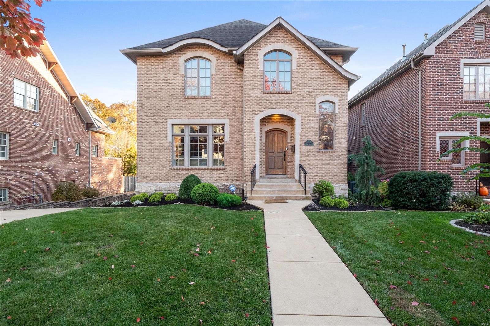Steps away from Clayton, this University Hills home offers timeless design with modern amenities. A seamless flow between the formal rooms and gourmet kitchen invites effortless entertaining. Ideal for cozy family time or large gatherings, the spacious family room and kitchen features a huge marble island with seating, custom cabinetry, high-end appliances, and two sets of sliding doors opening to the generous deck. You’ll find four bedrooms upstairs, including the primary suite with dual closets and a spa-like bath with a soaking tub, walk-in shower, and double vanity. There’s an additional bedroom with an en-suite bath and two bedrooms that share a direct-access bath. Plus, convenient 2nd-floor laundry! The lower level delivers a rec room, full bath, and an impressive wine cellar. An oversized 2-car garage, irrigation system, and new HVAC systems enhance the property. Walk to Taco Buddha, Flynn Park, and downtown Clayton - this home offers both luxury and a stellar location! Additional Rooms: Wine Cellar