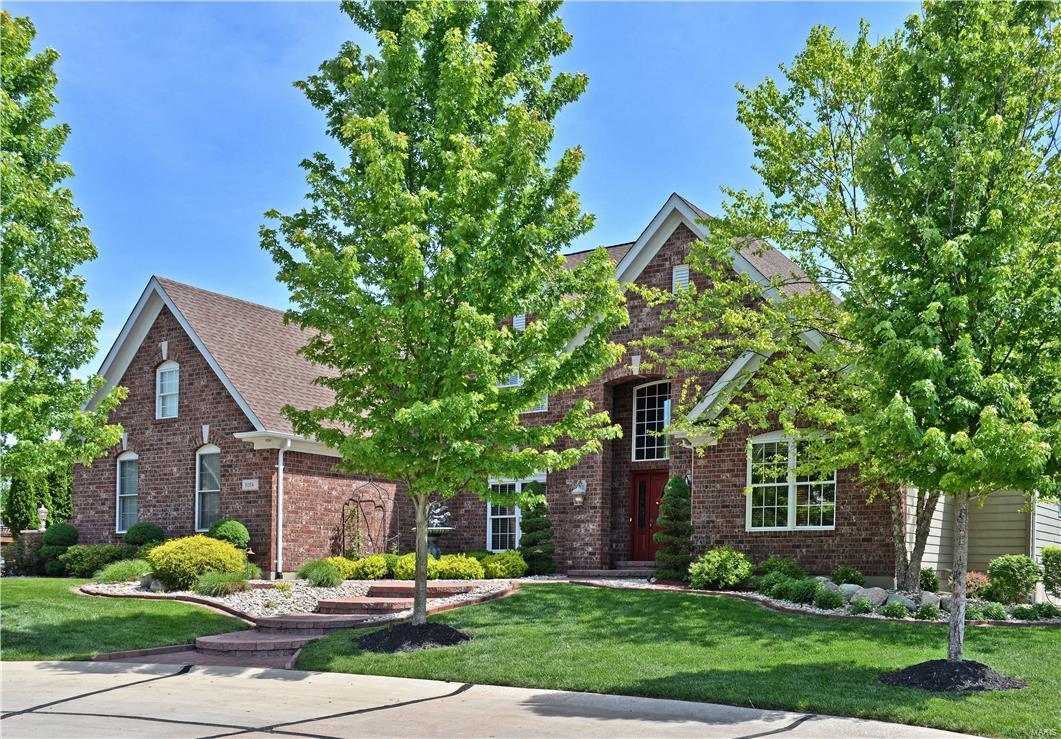This Home is AMAZING! 6380 SF of Luxury! Brazilian cherry wood flooring. Palladian, transom, and bay windows.  Balconies, loft, columns, French doors, arched doorways, built-in cabinetry, vaulted, cathedral, and tray ceilings,  Spacious gourmet kitchen features Wolf, Asko, and Sub Zero appliances (2 built-in convection ovens), granite counters, custom tile backsplash, butterfly center island, raised breakfast bar, walk-in pantry. Vaulted hearth room with walk-out to composite deck overlooking private setting with salt water pool, cool deck, and spa.  Covered patio, built-in BBQ.  Luxury master w/ tray ceiling, bay window, fabulous walk-in closet. Master bath has walk-in shower w/ tile and glass block surround, stained glass above the whirlpool, private water closet. Lower level has fam. rm w/ walk-behind wet bar, granite counters, ice maker, dishwasher, full fridge, sub-zero wine cooler. LL also has media room, 5th BR, exercise rm, and extra 1/2 bath. Tricked out 3C garage!  AMAZING! Additional Rooms: Mud Room