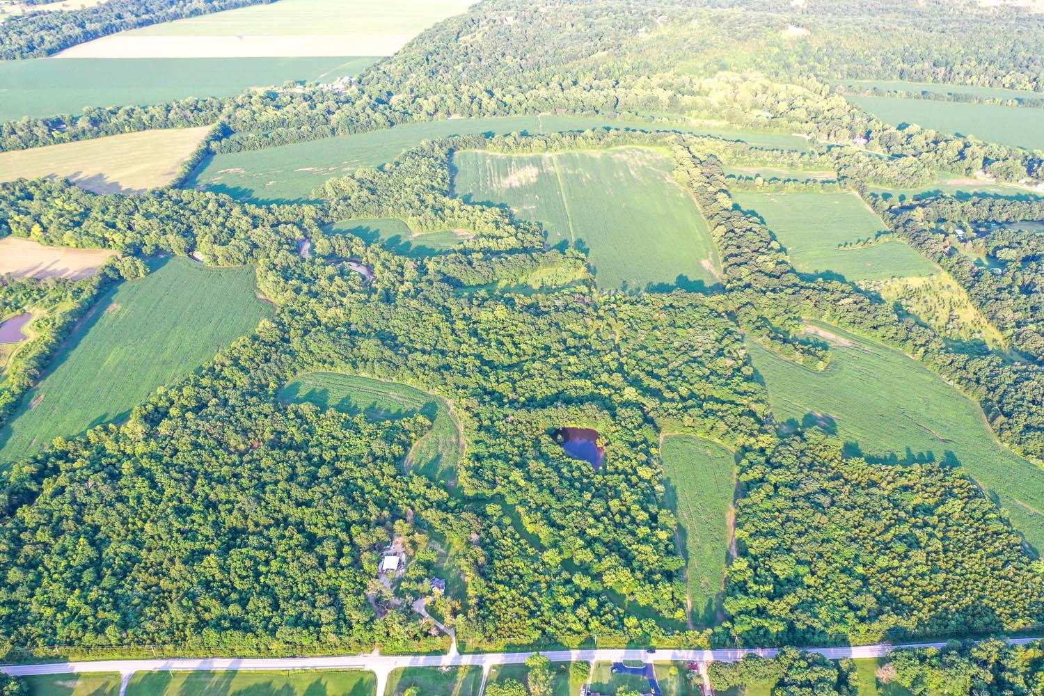 This farm is the perfect investment for the times we are living in. Farm land as well as farm commodity prices have increased significantly and many professionals look for continued strength in land. This is a very hard to find large piece of income producing ground. The property is within a very easy 45+/- minute drive of St. Louis and part of the land is bordering the Big River. Besides the farm production there is great recreational possibilities and possibly places to build a house. The land is bordered on two sides by very well maintained paved roads. This farm opens up the opportunity to own a piece of land to many buyers. Size, Location and price are all made to order with this purchase
