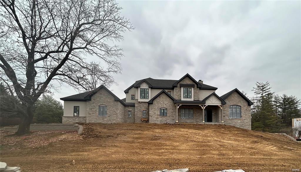 Location, location, location!   This spectacular new construction in Town & Country is walking distance to Long View Park, Starbucks, Clementine's Creamery, Straub's and much more! Easy access to the interstate and restaurants. Tucked away in a quiet subdivision filled with mature trees, it’s more important now than ever to love where you live and this home fits the bill! Fabulous floorplan includes a gourmet kitchen with endless cabinet space, including a beverage center.  A destination Owner’s Suite, you will never want to leave. Spa-like Owner’s Bath with a vaulted ceiling, stand alone tub and separate large shower. Multiple fireplaces, gas & wood-burning, including one in the outdoor living space. Great for entertaining! The 2-story great room features a cathedral beam ceiling with a Juliet balcony. The second floor boasts three oversized bedrooms, a jack and jill bath, and a loft area.