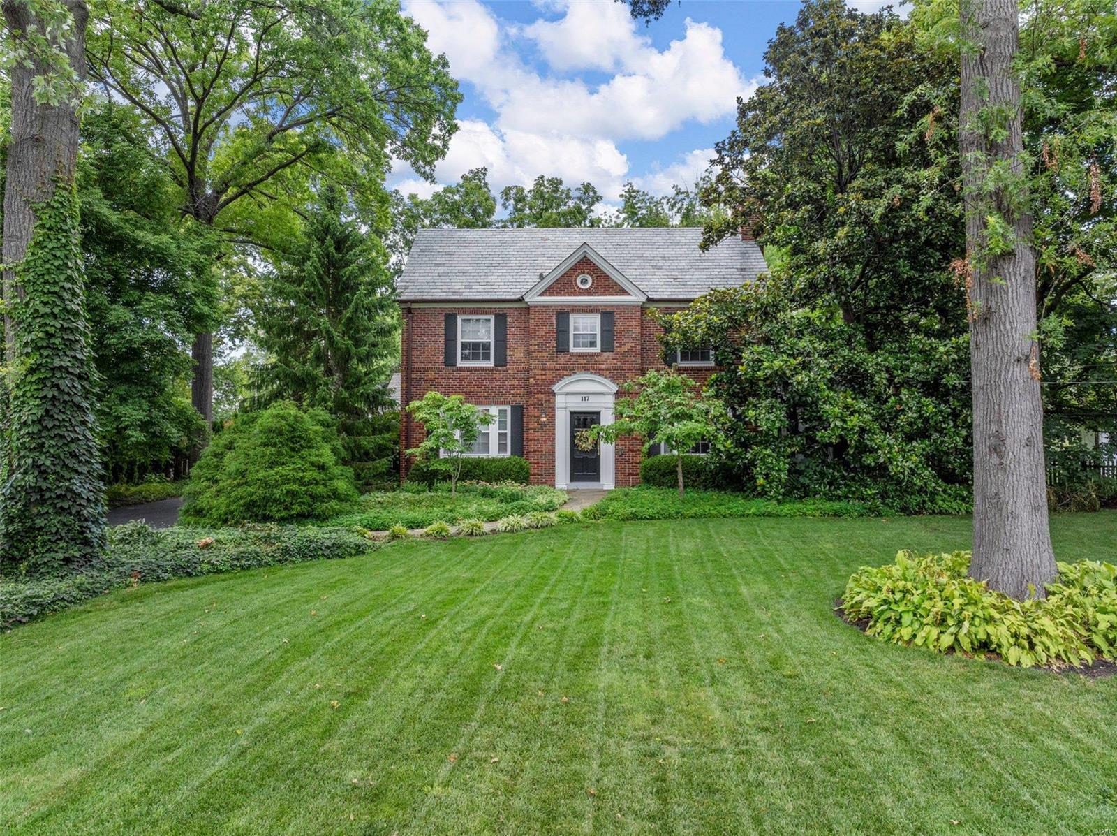 Discover timeless elegance in this stately, classic brick 4-bedroom home nestled in the heart of Kirkwood.  Once you enter through the unique entryway, you will discover a large living room with hardwood floors and beatuiful millwork, a formal dining room, spacious additional family room, and two versatile office spaces-perfect for remote work or creative projects.  Spanning over 3,000 sq ft of beautiful living space, this gem boasts a newly designed primary suite and three additional large bedrooms with custum closets on the upper floor. The large, private backyard is an oasis of tranquility, featuring a charming gazebo—ideal for outdoor entertaining or peaceful relaxation. Located just a short stroll from the vibrant downtown Kirkwood, you’ll have easy access to an array of shops, amazing restaurants, and the iconic farmers market. This home offers the perfect blend of classic charm and modern convenience, providing a truly exceptional living experience.