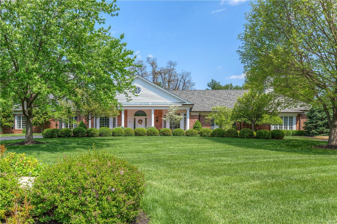Beautifully designed brick ranch on 1.45 ac grounds! Higginbotham-built home features over 8500 sf of living space enhanced by handscraped hardwood & Antica Apia stone flooring, exquisite millwork, vaulted ceilings & textured walls. Elegant marble foyer leads to coffered living & dining rooms with wide bay windows & spectacular family room with stone fireplace, granite wet bar & French doors that open to brick terrace. State-of-the-art kitchen with 42” glazed cabinetry, granite countertops, professional quality appliances & center island adjoins light-filled breakfast room & octagonal sunroom. Coffered master bedroom suite with 2 walk-in closets, dressing room & lavish bath with Jacuzzi plus 3 additional bedrooms & 2 full baths complete the main floor living quarters. Incredible walk-out Lower Level includes recreation room with brick fireplace & custom 15’ bar, game room, media room, workout room & full bath. Private cul-de-sac lot with impeccable landscaping, terrace & 3-car garage. Additional Rooms: Sun Room