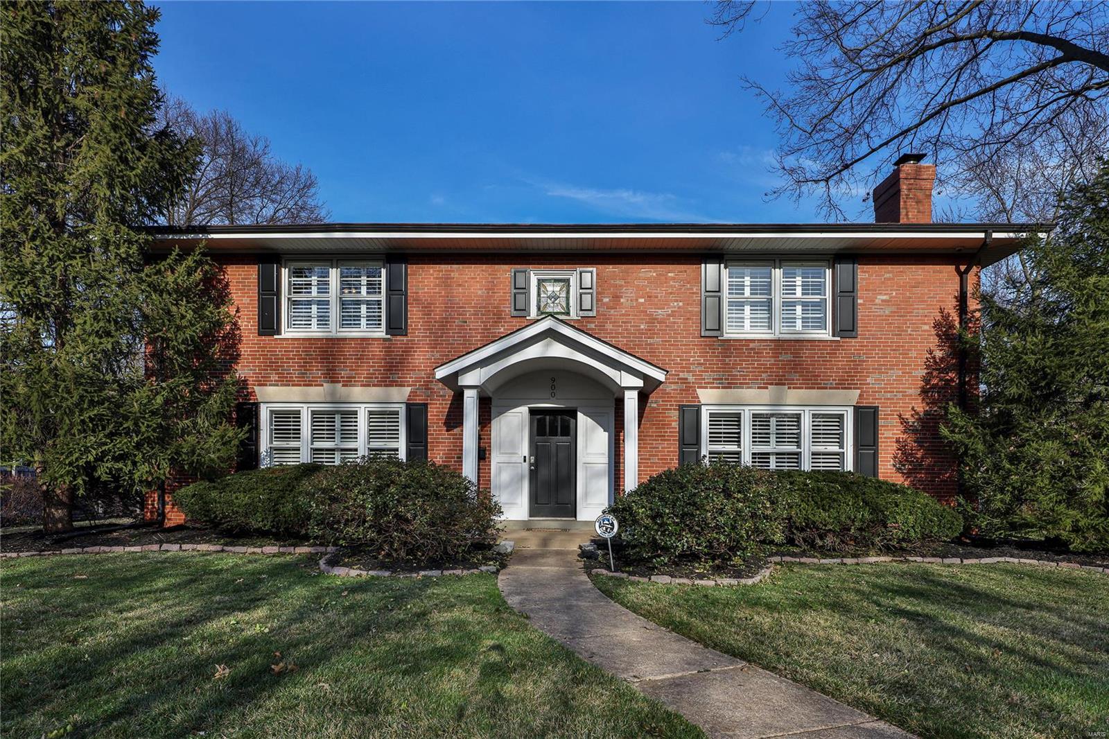 Symmetry meets Classic Perfection in this thoughtfully updated beautiful 4 bed,21/2 bath home set on a generous lot in Davis Place. Freshly painted rooms highlight the bright natural light, spacious rooms, custom woodwork and the natural flow of the home. A Den/Study off the entry is a bonus! The Living Room has a wood burning fireplace & bookcases. The Dining Room features Custom Cabinet and Pocket Doors. A full renovation of the Kitchen w/the addition of a Breakfast Rm, Family Room and Screened Porch allows you to enjoy the benefits of this lovely home. The Screened Porch is perfect for Morning Coffee/Afternoon cocktails. The kitchen is a chef's dream & is equipped w/Jenn Air & Kitchen Aide S/S appliances & ample cabinets.  Upstairs are four large bedrooms, w/walk in closets & two updated bathrooms with heated flooring. The Recreation Room in the lower level allows for entertaining, workout/gaming area. The Laundry Room, Bonus Room and extra storage are located on the lower level.