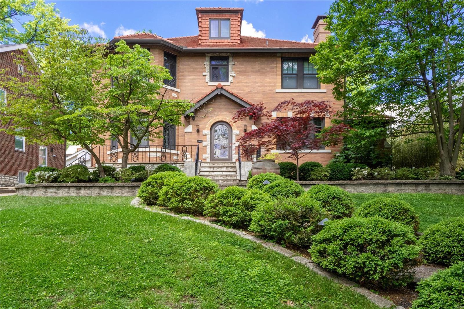 Within Claverach Park's prestigious leafy enclave is a charming abode that showcases classic craftsmanship and exquisite architectural detail. A terraced path framed by lovely landscaping winds to a welcoming entrance with an intricate archway. Inside unfolds a home imbued with character; complemented by contemporary additions & feel. Marvel at masterful millwork, distinctive carved mantel & beautiful crafted Stained glass windows and refurbished floors, French doors, Tudor-style windows, arches & stairway. Large living areas & bedrooms are light-filled and invite relaxation. Bathrooms are well-appointed. A roomy kitchen offers Dacor & SubZero appliances, pantry space, granite counters and a peninsula to double as an entertaining hub. And let the good times flow alfresco onto the large deck with a gazebo. Bonuses: 3-car garage, flexible heated lower level, landscape lighting, irrigation and a prime location, minutes from acclaimed schools, Wydown bike trail and Clayton's vibrant heart. Additional Rooms: Sun Room