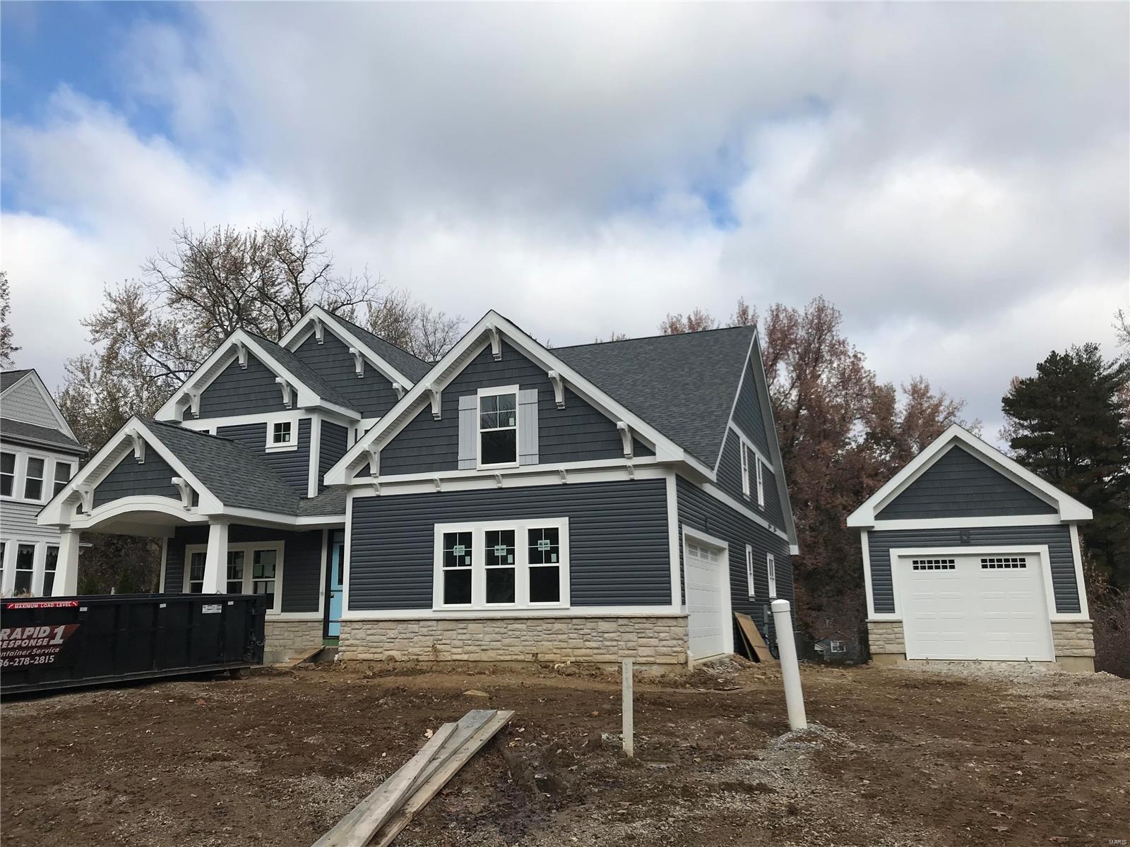 Spectacular new 1.5 story under construction by Boulevard Custom Homes.  This 4 bedroom, 3.5 bath, home features astounding finishes which include a 3-car garage, job stained hardwood flooring 1st floor and 2nd floor hall, gourmet kitchen with true custom cabinetry, large island and peninsula counter, crown molding, soft close drawers, 3 lazy susan's, pull-out spice rack, trash pullout, Quartz countertops, stainless steel appliances, under cabinet lighting, large walk-in pantry, built-in lockers, and impressive screened in rear porch.  12' high beamed ceiling in great room offers a fireplace, wine bar with wine cooler,  den/study with beautiful wainscot. Elegant master bedroom suite boasts coffer ceiling, large walk-in closet, adult height vanities, stand alone tub in master bath.  Other amenities include mahogany wood front door, wood treads on stairs, a expansive 2nd floor bonus room, 2 full baths on 2nd floor, large bedrooms with walk-in closets. Additional Rooms: Sun Room