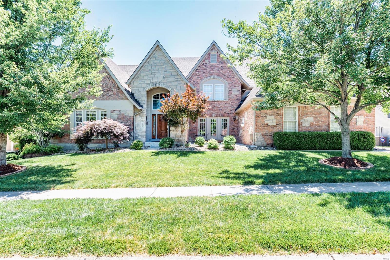 Over looking the bluffs of the Mississippi River, this home has views most dream of! A grand marble entry boast custom millwork, columns & detailed crown molding. Two story great room w/ built in bookcases, gas fireplace, floor to ceiling bow windows w/ breathtaking views overlooking Cliff Cave Park & the river. Paneled study & formal Dining flank the foyer, DR has a private patio! Chef's kitchen has just been completely remodeled w/ quartz counters, 42" cabinets, new island, Sub-zero refrigerator, 6 burner Viking gas stove, walk in pantry. Master suite is a masterful retreat w/ tray ceiling, crown molding, 2 huge walk in closets, MB just remodeled w/ separate vanities, soaker tub & vaulted ceilings frame a priceless view! LL was just completely remodeled as well and has an incredible finished LL that walks out to the pool. A private no maintenance deck above or the pool deck below, you'll see for miles while enjoying the in-ground pool. All bathrooms just updated too.