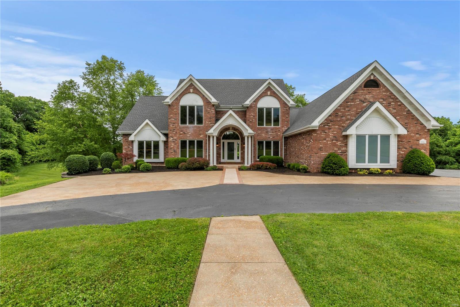Simply one-of-a-kind, this wonderful custom 1.5 story home, is situated on ten impressive acres. A private & gated residence within the picturesque Wild Horse Heights neighborhood of Chesterfield w/a circle drive & featuring an in-ground swimming pool, party deck & tennis court, overlooking ‘The Valley’ as well as the possible stable & pasture where your horses can roam & thrive!... This lovely land is a combination of (3) tax parcels 18W-31-0289, 18W-31-0267 & 18W-31-0366. You may view the land survey & many more glorious details about our exquisite home & property @226 Fick Farm Rd @the supplements portion of this MLS Listing. This amazing home boasts a grand 2-story entry foyer, formal dining & study, vaulted 2-story great room, huge kitchen & incredible master suite, both fully updated. Exceptionally finished Lower Level, three upstairs ensuites & ALL FOUR BR's boast custom WICs by California Closet Company. YOUR DREAMS COME TRUE HERE!