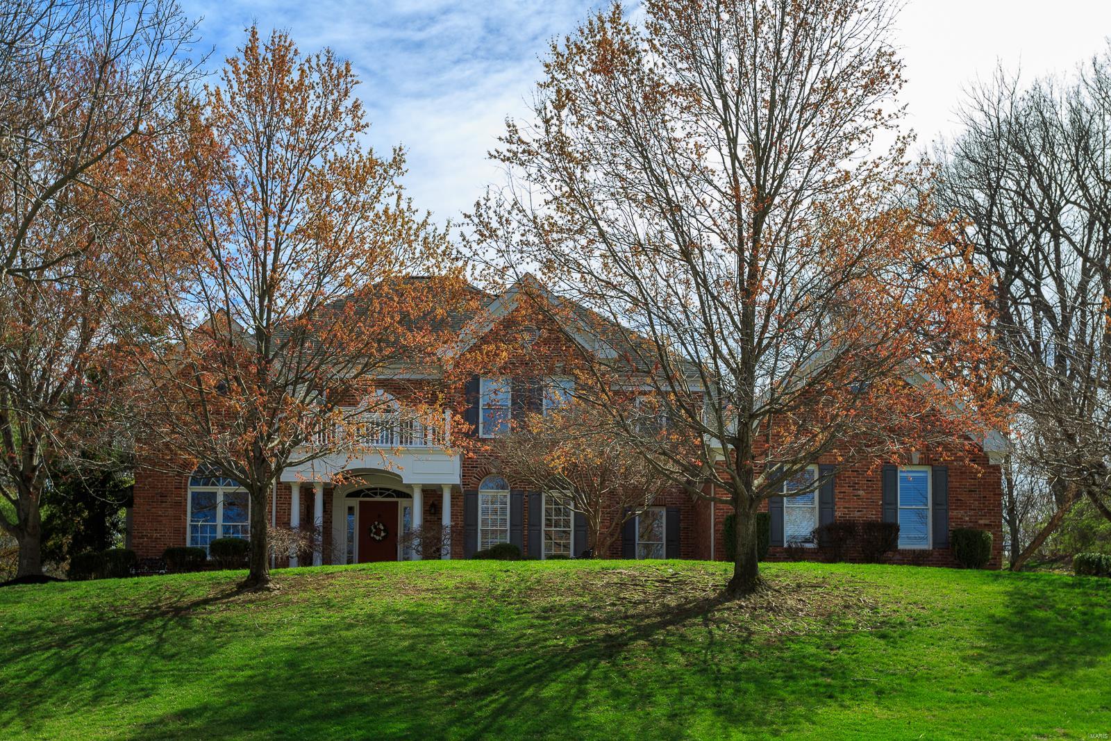 OUSTANDING 1.5 Story in sought after Wildhorse Village Subdivision. Updated home on private, landscaped 1 acre w trees. Stunning Custom Gourmet Kitchen w unique Granite on massive island, 2 Built-in Butler's Pantry plus other storage areas. Updated Lighting fixtures. Tall cabinets w glass fronts on top. Kitchen, w proximity to Breakfast Rm, Hearth Rm, Dining Rm, Great Rm. Some Light fixtures updated. Wood floors. 2 Story Great Rm w Wall of Windows w Plantation Shutters, Wet Bar, Stone Fireplace. Master Suite tastefully decorated. UL has 3 beds w 2 baths. Professionally finished LL has electric Fireplace, Entertainment area, Kitchen/Wet Bar area, Rec Rm, plus 1/2 bath. Outdoor space has Composite Deck, Pergola, & Hot Tub stays. Ask for list of improvements. Great Schools. Easy walk to Community Pool, Tennis Court and 2 Fishing Lakes. Subdivision has 3 Swimming Pools, 3 Tennis Courts, Lighted Sidewalks, walking paths. Rockwood School District. Easy access to Major Roads & Shopping.