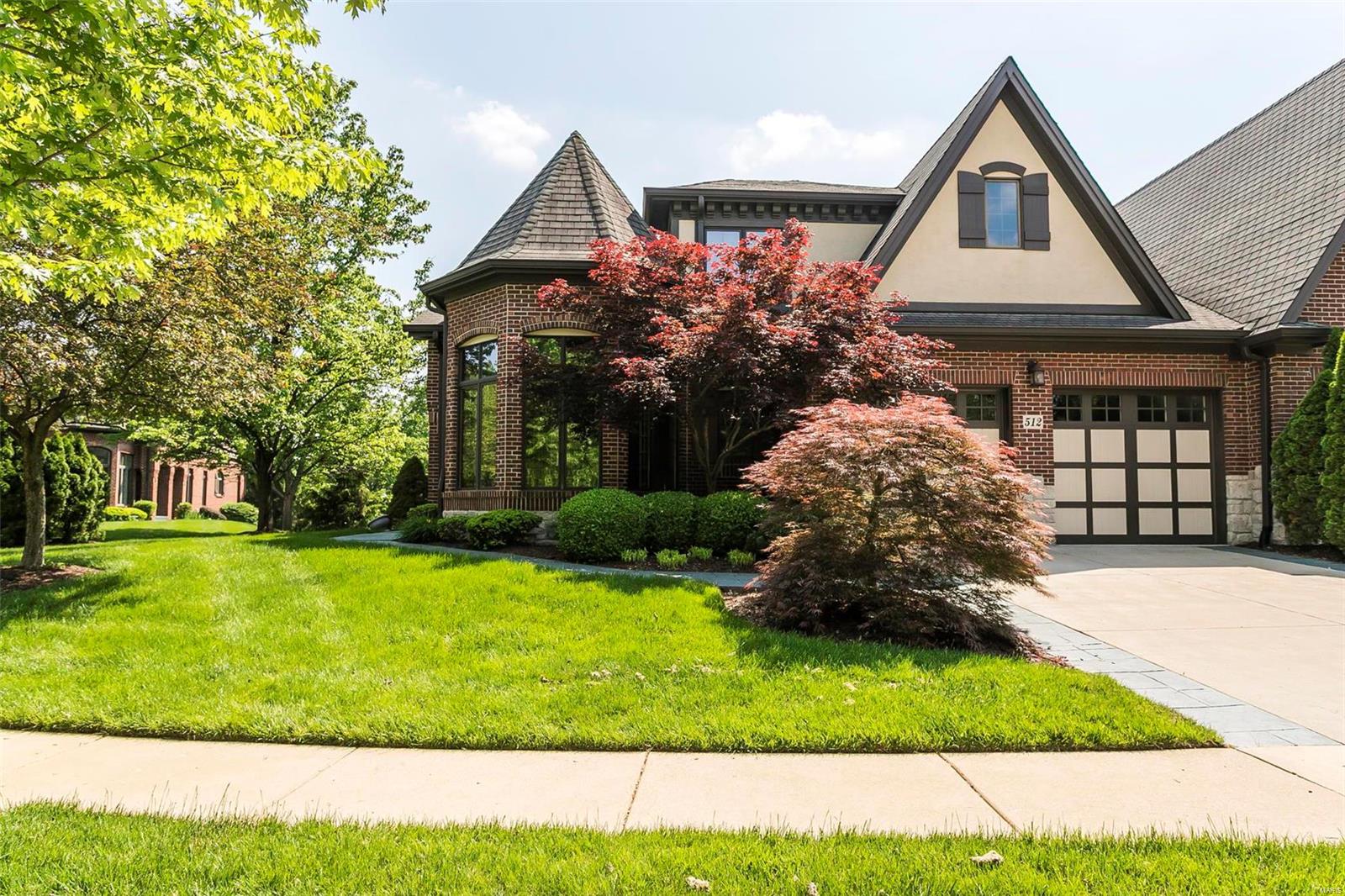 Don't miss this spectacular updated 1.5 story villa home in the prestigious gated community of August Hill! This unit sits on the corner of a cul-de-sac which lends to beautiful extended yard space to the side. Impressive entry foyer leads to a regal octagonal executive study.  Elegant dining room highlighted by architectural columns. Huge great room w/souring ceilings, large windows, recessed lighting & fireplace. Gourmet kitchen w/42” custom cabinetry, stainless steel appliances, double ovens, sub-zero refrigerator, granite countertops & more. Breakfast room leads to lovely upper level patio. Large master bedroom w/gorgeous coffered ceiling, bay window & huge luxury bath w/dual vanities, large walk-in closet, shower & soaking tub. Beautiful hardwood flooring throughout main floor. M/F laundry w/wet sink. Two additional bedroom suites upstairs both w/walk-in closets. The finished w/out LL has a full bath, wet bar, 4th bedroom & and a screened in patio. Easy access to HWY 40 & 141! Location: Ground Level