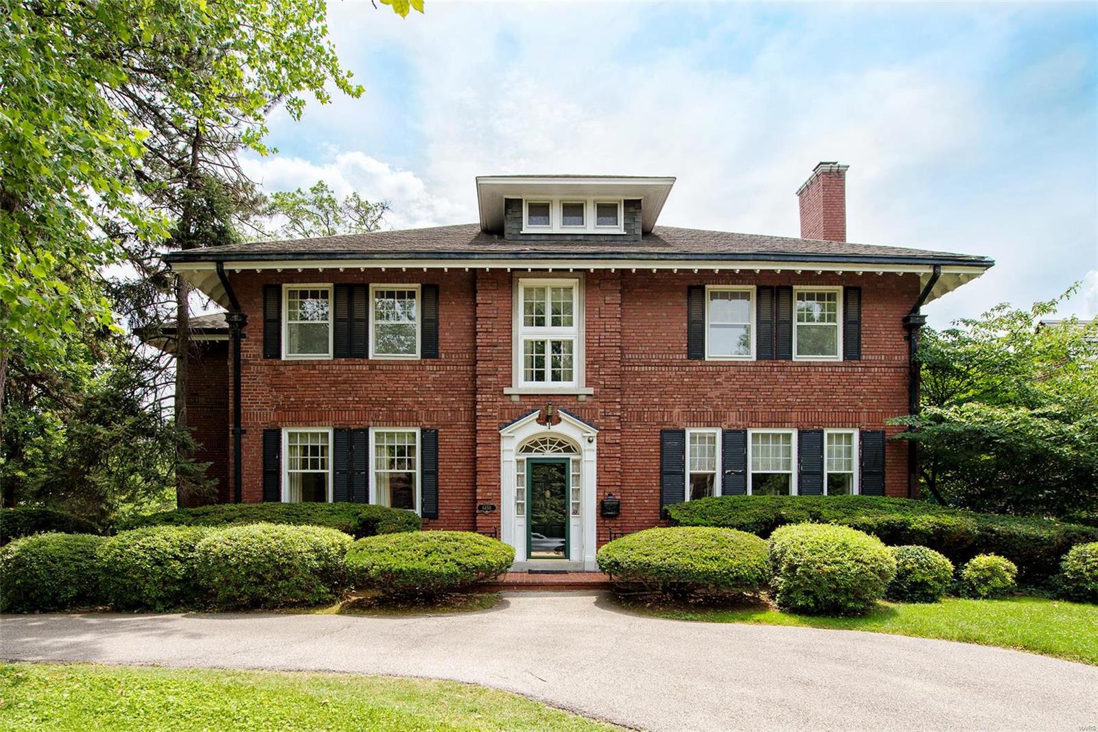 This unique manse is on the market for the first time since it was built, and one family has owned it the entire time. It's made for entertaining on a large scale. Soaring ceilings make the living and dining rooms feel palatial. The light and bright kitchen is flanked by a butler's pantry located next to the breakfast rm. Retire w/your guests to the library or family rm, some of the many rooms with built-in cabinets and bookshelves. A terrace looks out over the extra large lot. Tired after the party? Ascend the grand staircase to your choice of 6 bedrooms serviced by 4 full baths.  2 car tuck-under garage. Nooks and crannies, secret passageways and history abound here; in fact, many of St. Louis' finest institutions and non-profit organizations were conceived and planned out on this very property.Spot-on location close to Washington University, Forest Park, Clayton, & downtown. With imagination and effort, this home will be a dream on a premier street in our town. SOLD AS IS.