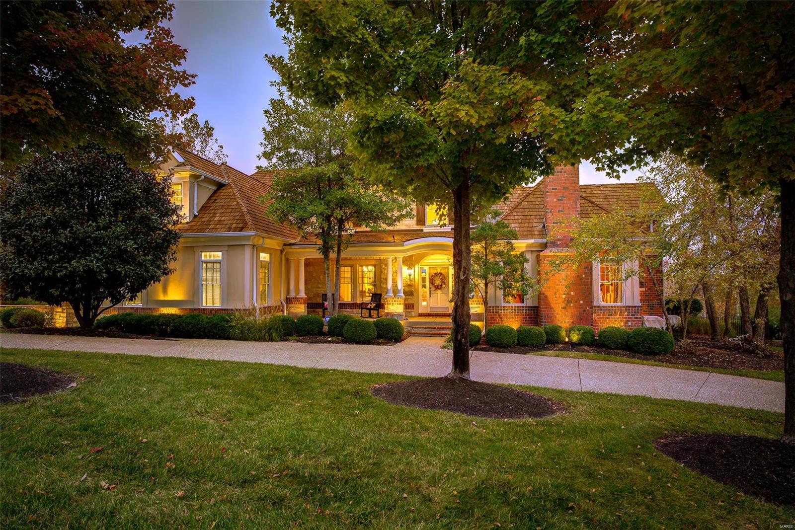 Ultimate privacy in the gated Bluffs of St. Albans on 2.5 acres. 7,400 sqft, 1.5 stry custom home features 5 bdrms, 5 full & 2 half baths plus bonus room, ideal for craft or play room. Perfect for entertaining w/open floor plan, deck w/gorgeous views overlooking the bluffs, patio & inground pool. Breathtaking views from almost every room in the house. Newly finished hardwd flrs thru-out most of the main level. Extensive mil-work throughout the home brings a sense of one-of-a-kind style. Gourmet Kitchen features upgraded Wolf appls, huge island, & granite counters. Massive Master Bed/Bath Suite is finished with granite and ceramic tile. Other features of the home include Library with direct access to Mstr, DR, GR, Hearth, Breakfast Rm, Butler Pantry, Laundry/Mud rm. Soaring ceilings, frnt/bck staircases with custom iron spindles. The perfect walkout LL has something for everyone to enjoy; Theatre, Fitness Center, Billiard Rm, Bar, Pool/Spa and Patio. Very private, Very Scenic, MUST SEE!