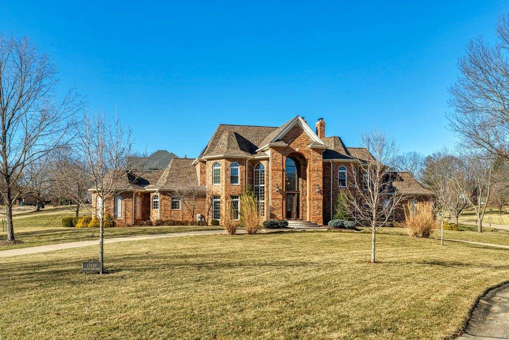 This impressive home in the heart of Town and Country is within steps of Queeny Park and has over $300,000 of recent, extensive updates buyers will love. Newer roof, skylights, siding, windows, 3 HVAC systems, water heaters, back porch addition, Sub-Zero Fridge to name a few. The soaring 2 story, light filled foyer, flanked by dining and living rooms, invites you into this stunning home. The 2-story great room has a fireplace, wet bar, media built-ins and a wall of windows. Updated center island kitchen has a Viking cooktop, dual Viking ovens, Sub-Zero fridge, walk in pantry with a breakfast room that walks out to the newer covered patio which is gorgeous! Den/office is conveniently right off the kitchen. First floor master suite features second fireplace, updated luxurious bath, adjoining office and access to patio. Five large bedrooms upstairs all with walk in closets. One bath is ensuite, plus hall and jack/jill baths. Fabulous Home!