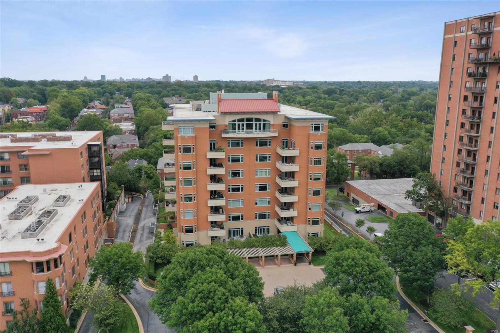 FOR COMPARABLE PURPOSES ONLY. Beautiful Penthouse level condo with large private balcony and gorgeous east, west, and north views toward downtown Clayton, residential neighborhoods, and downtown St. Louis all the way to the Arch. A special one-of-a-kind opportunity in one of the most sought after full service condo buildings in Clayton. High ceilings, elegant moldings, beautiful wood floors, built-in shelves, and a bright open floor plan. Spacious primary bedroom suite with huge professionally finished walk-in closet and elegant ensuite bath. Second bedroom suite with lovely private bathroom. Nice den/office plus a separate guest powder room and in unit laundry. A bright and cheerful condo that offers opportunities for easy entertaining and comfortable and relaxing living. Three garage spaces and a large storage locker in the heated garage. Elevator to all levels of the building. 24 hour door attendant. Inground heated pool. Party room. Exercise room. 2 guest apartments. Location: Upper Level