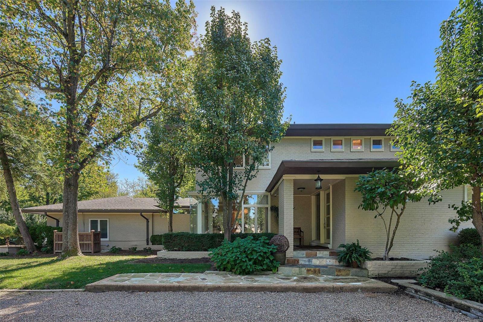 From the moment you enter this glamorous home you will be captivated by the openness and abundance of windows that look out onto the 3.3 acre estate. The foyer features a dramatic staircase that spirals to the second floor and lower level. Great entertainment spaces with an expansive living room, cozy den with fireplace and dining room. The outdoor spaces are key to  the property with a screened porch, private patio, volley ball court and large pool area. Gourmet kitchen with center island, gas stove, granite counters, pantry and breakfast room. The main floor master bedroom suite features expansive walk-in closets & dual luxury baths. Four additional bedrooms, one on the main level, with ensuite bathrooms. The full walk-out lower level continues the recreational areas with a full bar, fireplace, extra kitchen, pool bath, sauna, family room, billiards room, gym and office/craft area. 4 car garage. Greenhouse. Laundry on 2nd floor and LL. Additional Rooms: Mud Room