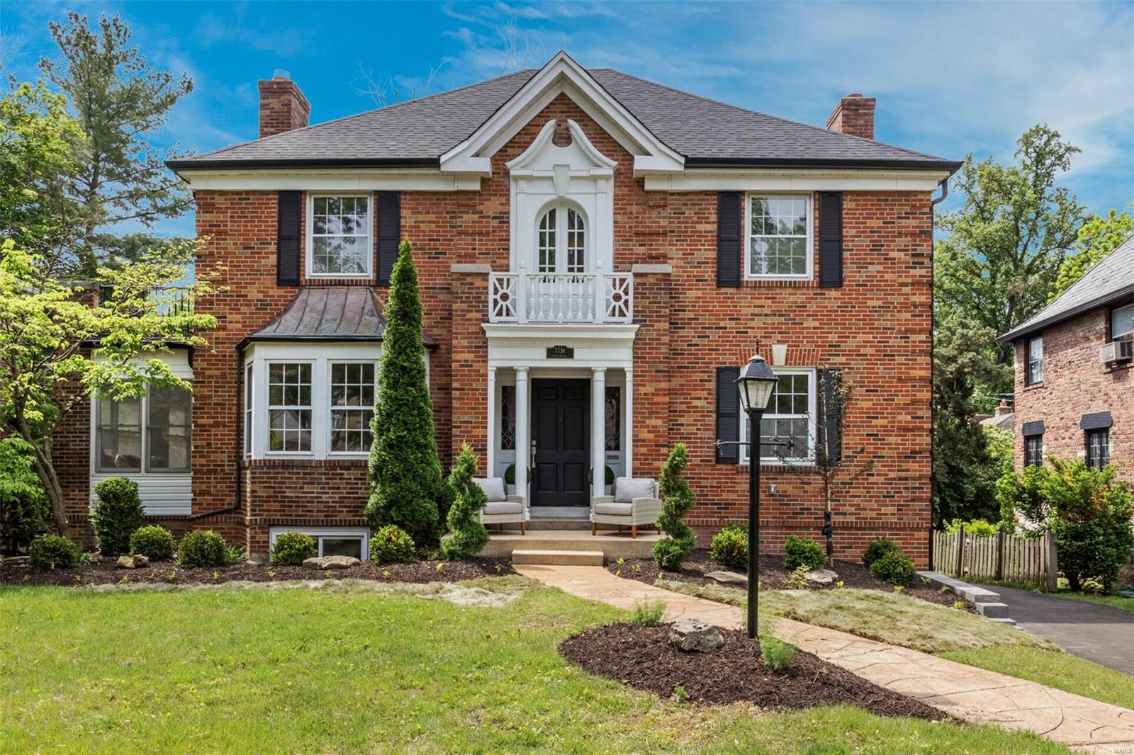 Professionally renovated executive style home in the highly sought after Davis Place neighborhood in Clayton! This stunning home has been completely renovated with attention to every detail. Upon entering you are greeted by a grand stair case in the entry foyer. Sun-filled living room with bay window and fireplace and is complimented by a cozy 3 seasons room. Large separate dining perfect for entertaining. Stunning updated kitchen with breakfast bar, stainless steel Kitchen Aid appliances and gorgeous cabinet and counters. A powder room and home office completes the main floor. 2nd floor hosts a tranquil master suite with full bath, walk-in closets and access to lovely terrace with fantastic views. Three generously sized bedrooms, full guest bath and laundry closet. Partially finished lower level boasts a family room with fireplace and new carpeting. The level yard will be the highlight of outdoor entertaining with a large deck and yard. Close to restaurants, shopping, parks and more.