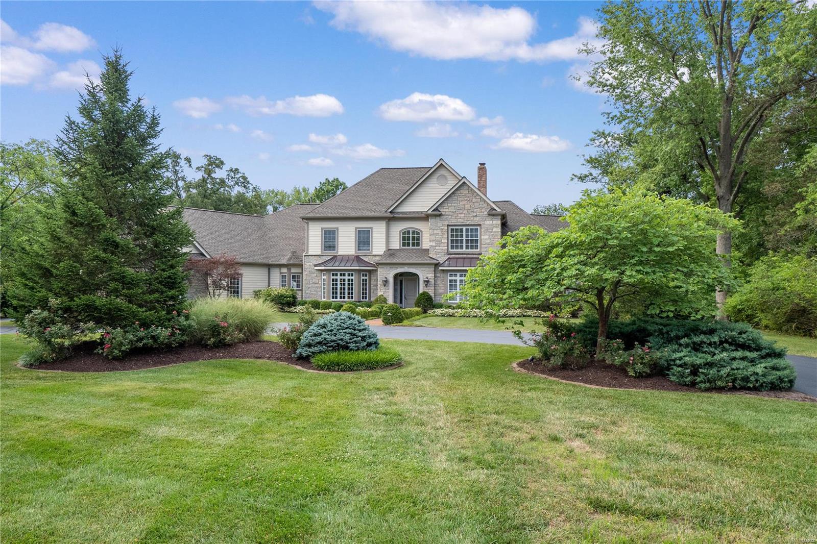 12 Chipper Road is an incredible 2-acre estate available for the 1st time in over 60 years. Built in 2005, this fabulous French Colonial home manages to make its spacious 4,600+ sqft feel warm and welcoming right from the start. A two-story great room sits centered on the main level, flanked by a private master ste and 2nd guest bedroom on one side and the kitchen and hearth room on the other. With gorgeous views of the property’s green space from every room, it’s no wonder the home’s designer chose to use windows so generously across the back of the house. The 2nd floor includes 2 additional bedrooms, each with its own private bathroom, while the lower-level rec room was finished with the same high-quality touches as the main living spaces. Just across the backyard, you’ll find an inground pool (with a 12’ deep end!) and a private tennis court, built years ago but well-maintained over several generations. This once-in-a-lifetime property is sure to be perfect for its next lucky owner!