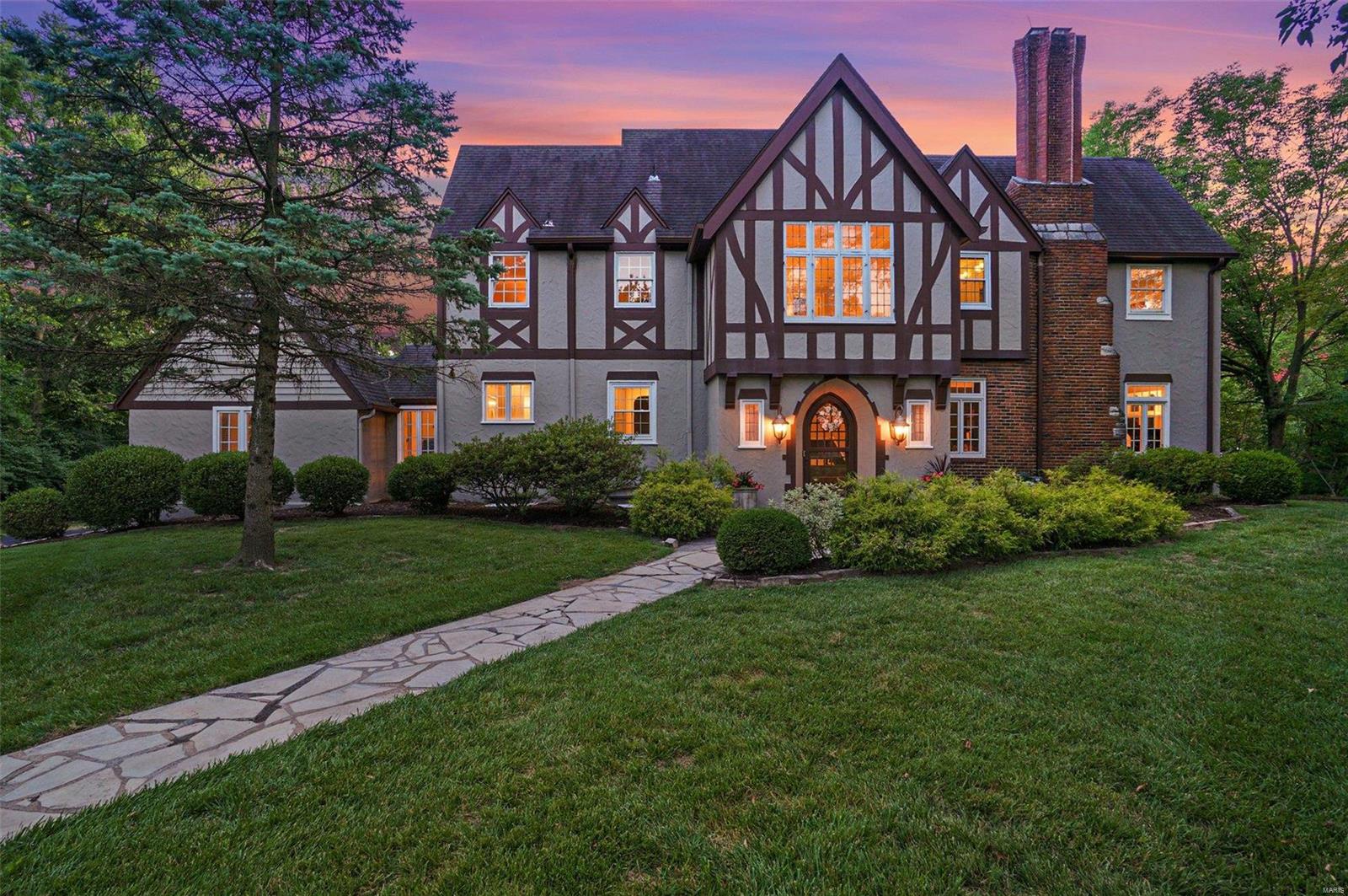 Indulge in this stunning Tudor-style home located in Westwood Country Club. This fully updated home in 2022 exudes old-world charm and modern amenities. As you step into the 2-story foyer, you will be captivated by the fine architectural details, including plaster walls and cast iron stair spindles. Stunning Terrazzo floors add elegance and durability to the living spaces. Entertain in style with the swanky bar that radiates its own vibe and the adjacent dining room perfect for hosting guests. The brand-new chef's kitchen boasts high-end appliances, quartz countertops, and custom cabinetry. Retreat to the main floor in-law suite or the huge master suite upstairs, featuring a sitting area, walk-in closet, and luxurious spa-like bathroom. Three additional bedrooms and two full baths provide ample space for family and guests. The spacious backyard features a sparkling swimming pool installed in 2023, perfect for hosting outdoor gatherings. BACK ON MARKET! NO FAULT OF SELLERS.