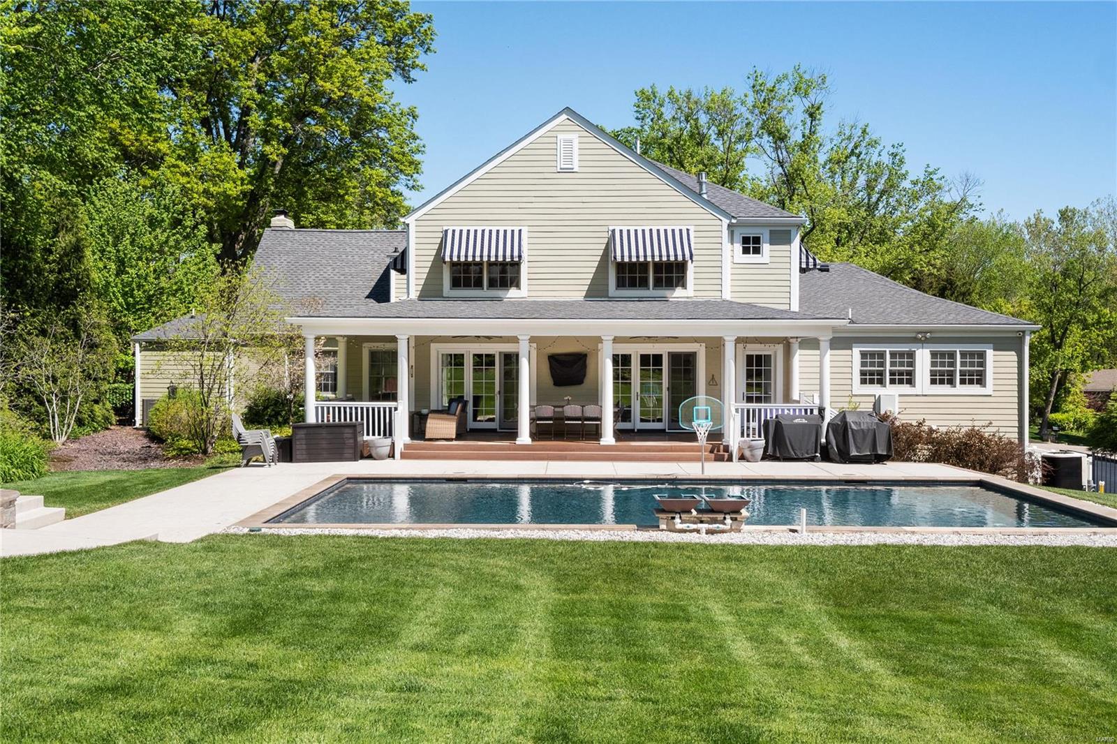 Beautifully renovated & updated 1.5 story on a lovely acre lot in sought-after Town & Country.  Step inside, you're greeted w/ spacious layout that seamlessly flows into newer kitchen/ great rm, Overlooking newer pool & inviting porch. Entertainer's dream: 2 expansive islands, high-end appliances, & bar area w/ice maker, wine refrig, & refrig drawers.The kitchen is a chef's delight, equipped w/ 2 dishwashers, 2 sinks, & lrg sep. Sub-Zero refrig & freezer. Generously sized custom dining table. The main flr boasts a lux primary suite w/ updated bath, as well as a 2nd bedm & updated full bath conveniently located near the poo.The 2nd floor, will surprise you w/ its spaciousness:4 bdrms, 3 full baths + bonus Rm. The LL offers abundant storage & Rec Rm underneath a new area + 1/2 bath. Outdoors, the property features a beautiful newer pool, a covered porch area, and a wonderfully level lot.3-car oversized garage. Perfect blend of lux living & practical amenities for indoor & outdoor Living.