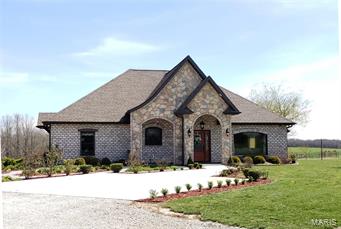 Exceptional 327+/- acre property offers perfect ranching opportunities, Gated entry leads to a 3BD/2BA custom French Country style home.  Working ranch set up for intensive grazing, most recently very successful registered Angus cattle operation running 100+/- cow-calf pairs.  30 Fenced pastures. 2+/- miles piped water. 270+/- open acres. Bottom field for row crops. 3+/- springs, stocked lake. 3240+/- sqft shop, 12x70 covered equip storage area, 12x72 lean to equipment shed. 18x15 finished office, 40x104 clear span hay barn with inside cattle working area. Arrow Catch squeeze chute/scale. Outside equip storage area. 2nd set lighted working pens, auto waterers set up throughout property. Features of the Home: Custom hardwood cabinets, low E Quaker wood windows, fireplace with marble surround, stained hardwood doors, plasters walls, large island with seating and prep sink, Copper farmhouse style sing, granite counter tops, tile back splash.  See Attached Brochure.